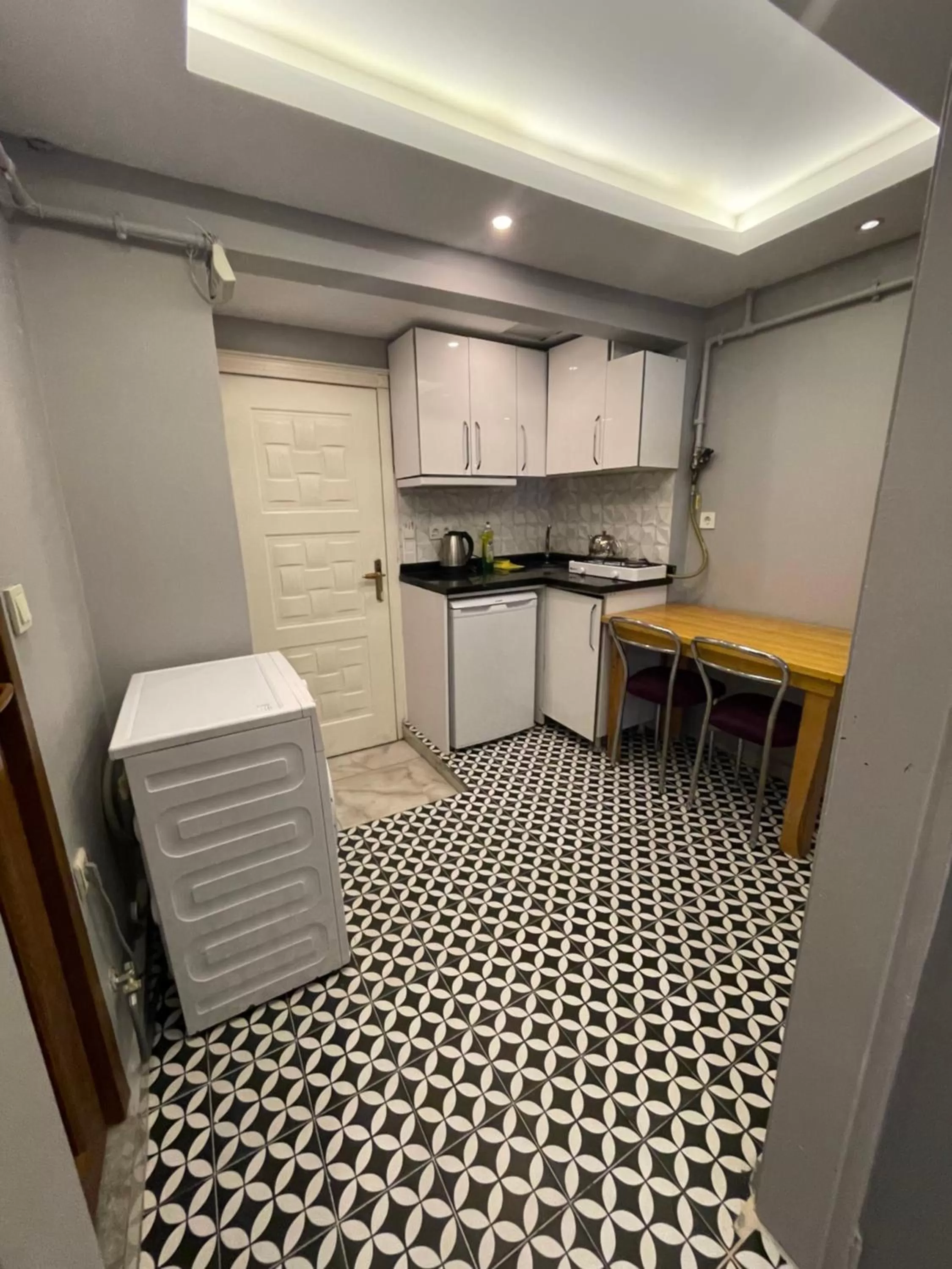 Kitchen/Kitchenette in Arat Apartments