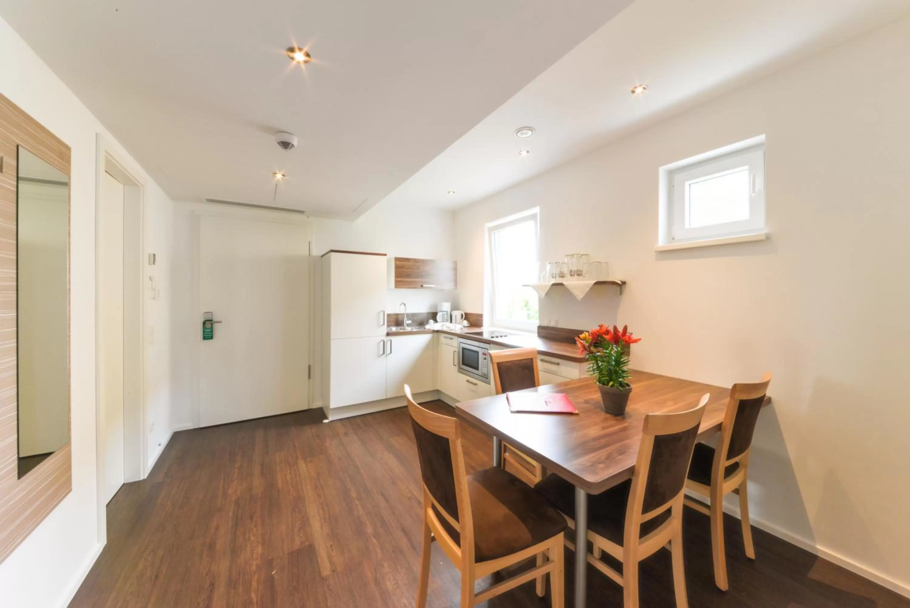 Kitchen or kitchenette in Abasto Hotel & Spa Maisach