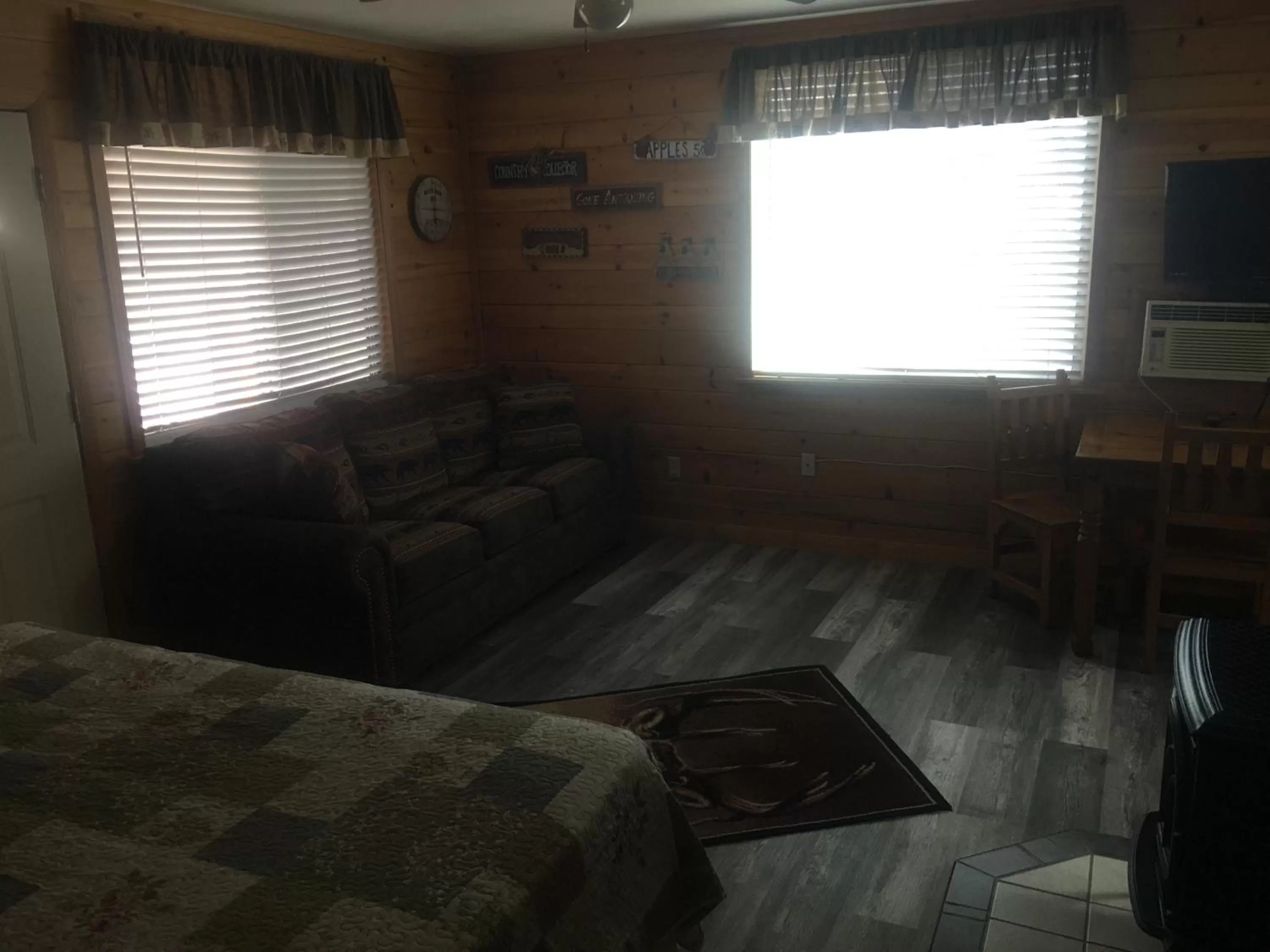 Seating area, Bed in Rainbows End Fishing Resort