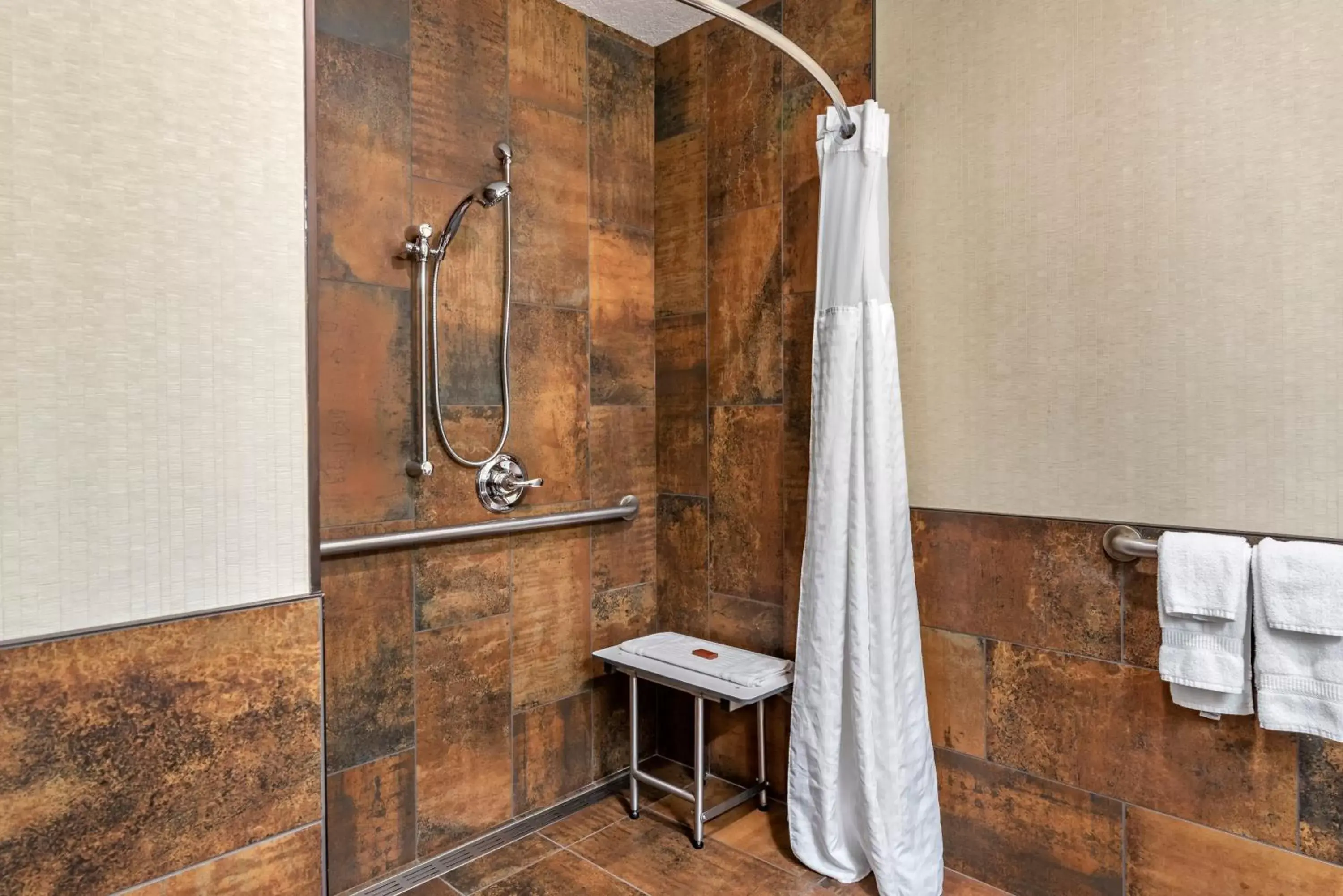 King Room - Mobility Accessible with Roll In Shower - Non-Smoking in Kathryn Riverfront Inn, an Ascend Collection Hotel King Room - Mobility Accessible with Roll In Shower - Non-Smoking in Kathryn Riverfront Inn, an Ascend Collection Hotel