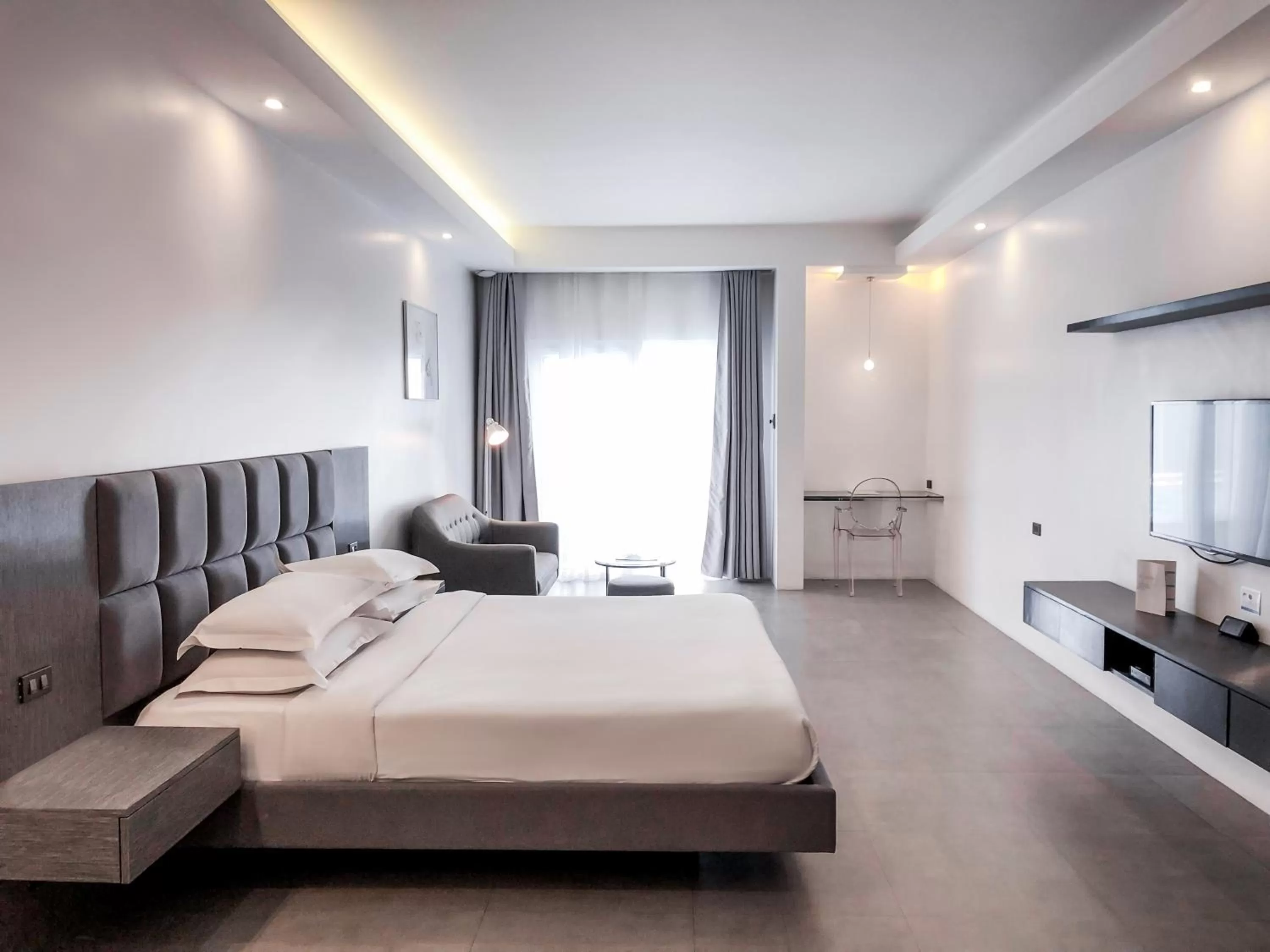 Photo of the whole room, Bed in Winds Boutique Hotel