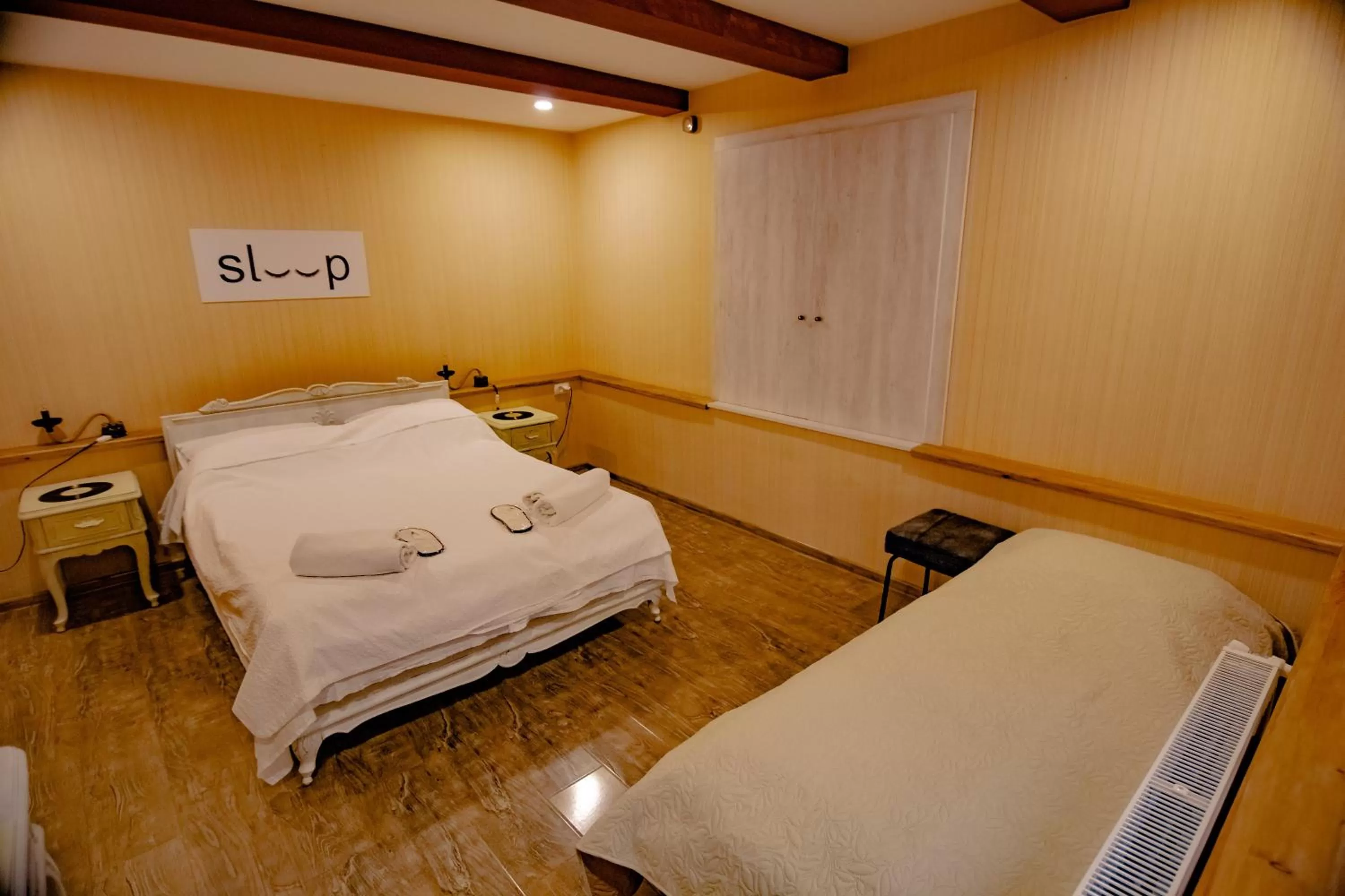 Bed in Qilimcha's Guesthouse
