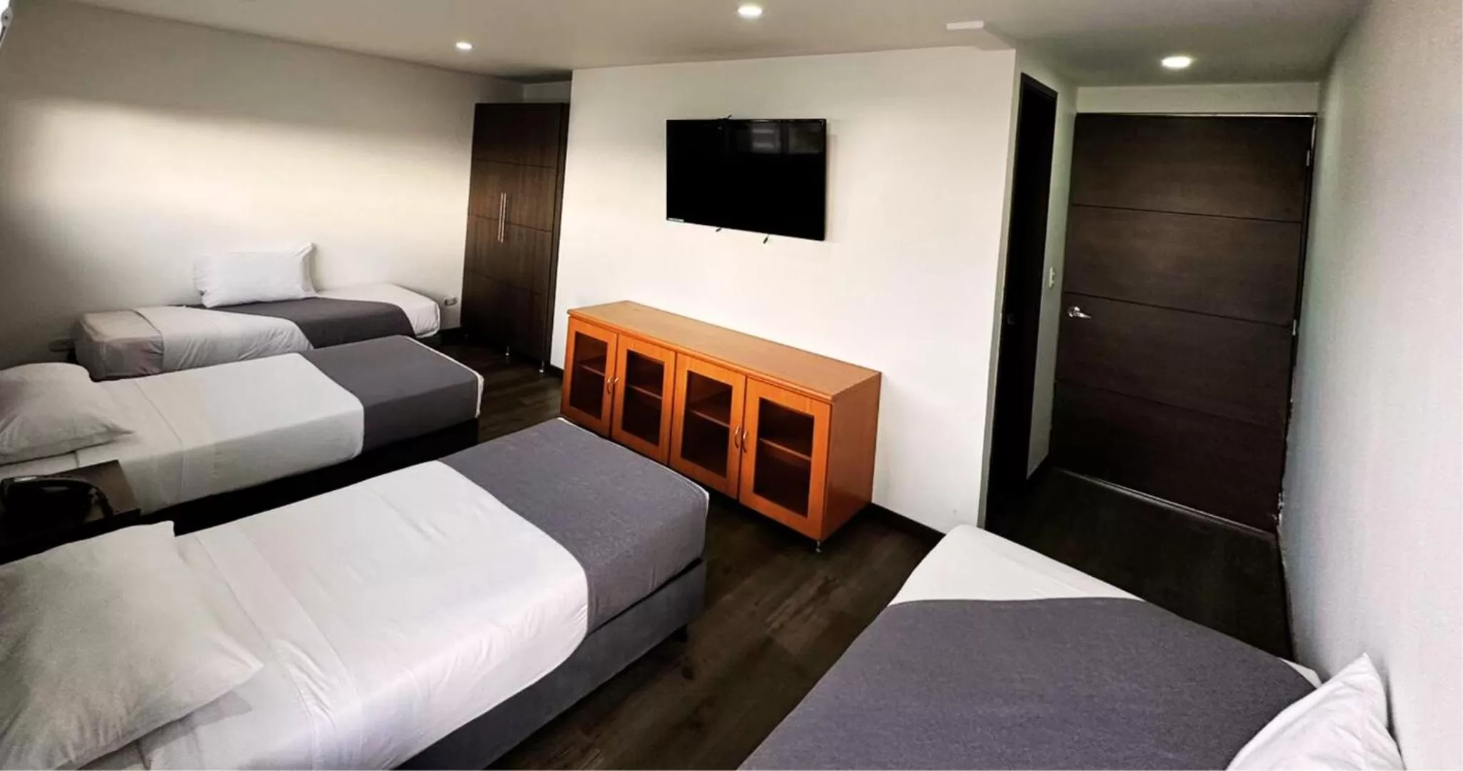 Communal lounge/ TV room, Bed in Hotel Expo Hotel Ferial