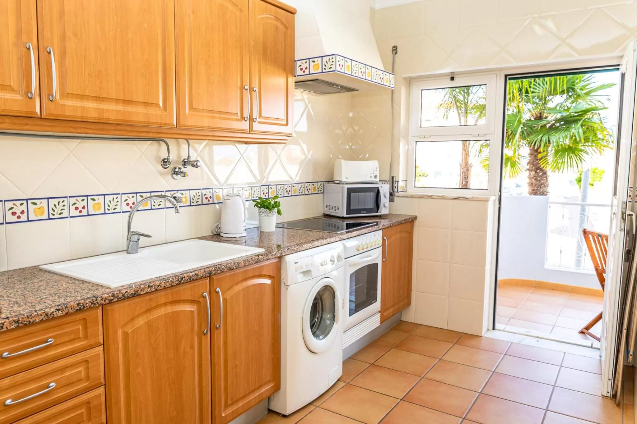 Kitchen or kitchenette in Giramar Apartamentos Turisticos