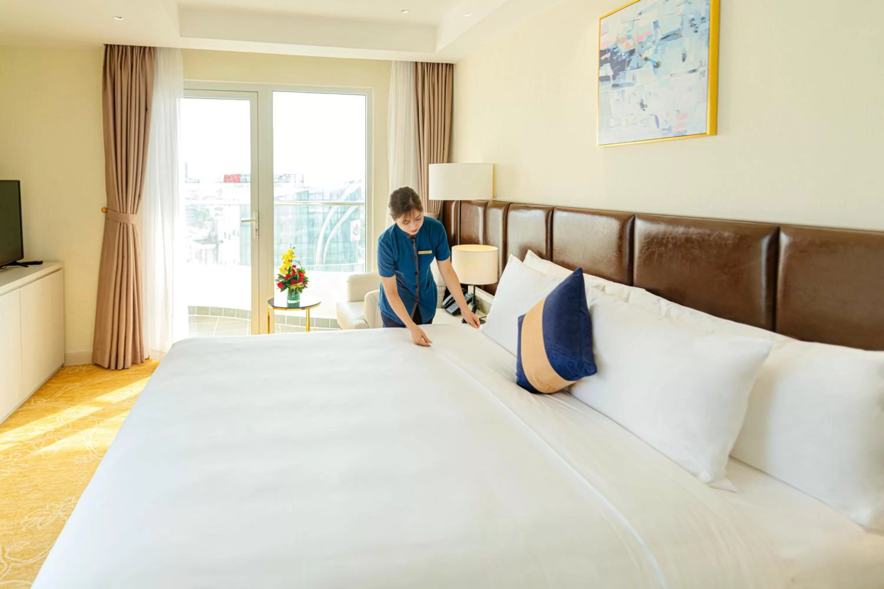 Property building, Bed in La Vela Saigon Hotel