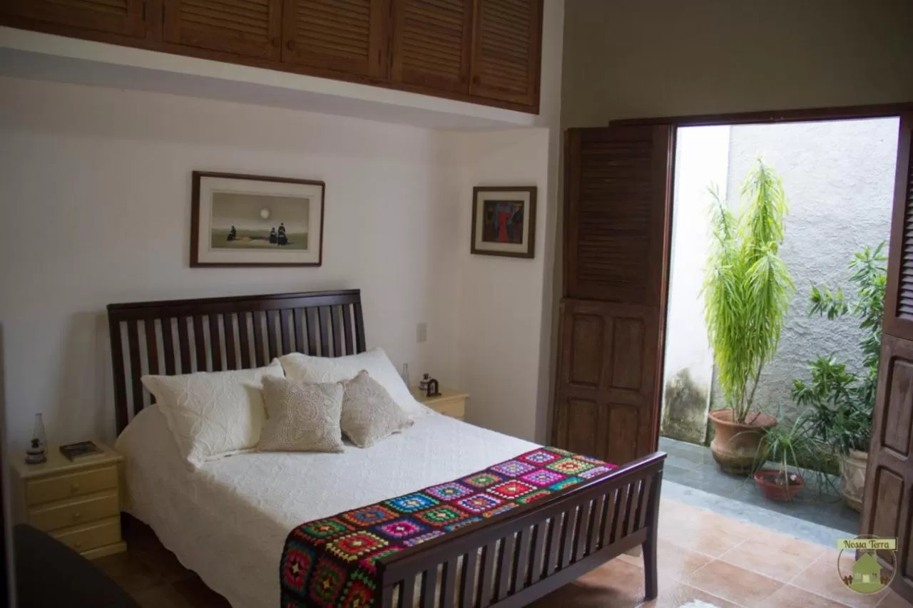 Bed in Pousada Nossa Terra