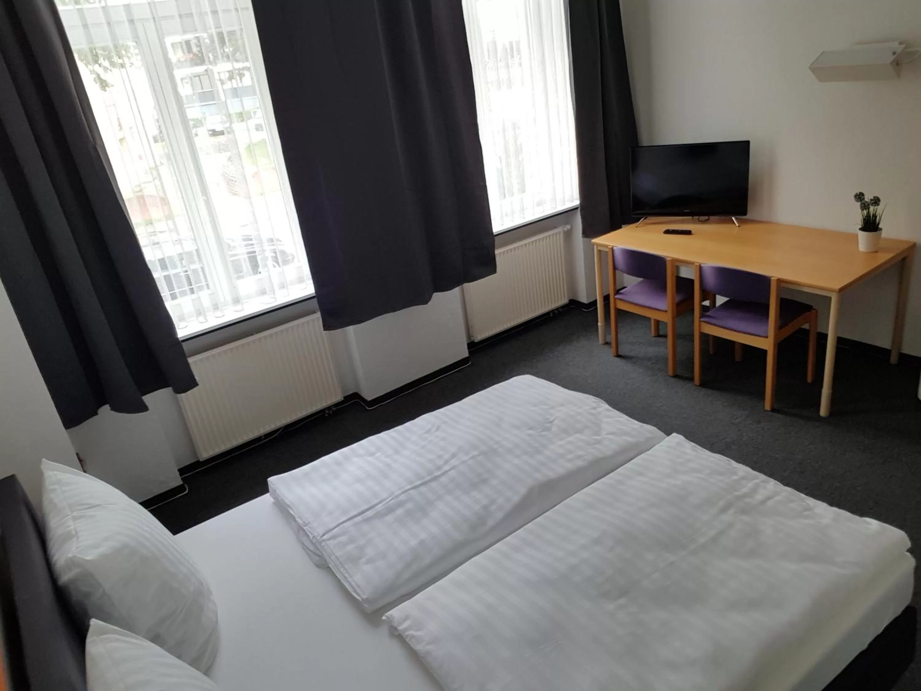 Bed in Appartement-Hotel Rostock