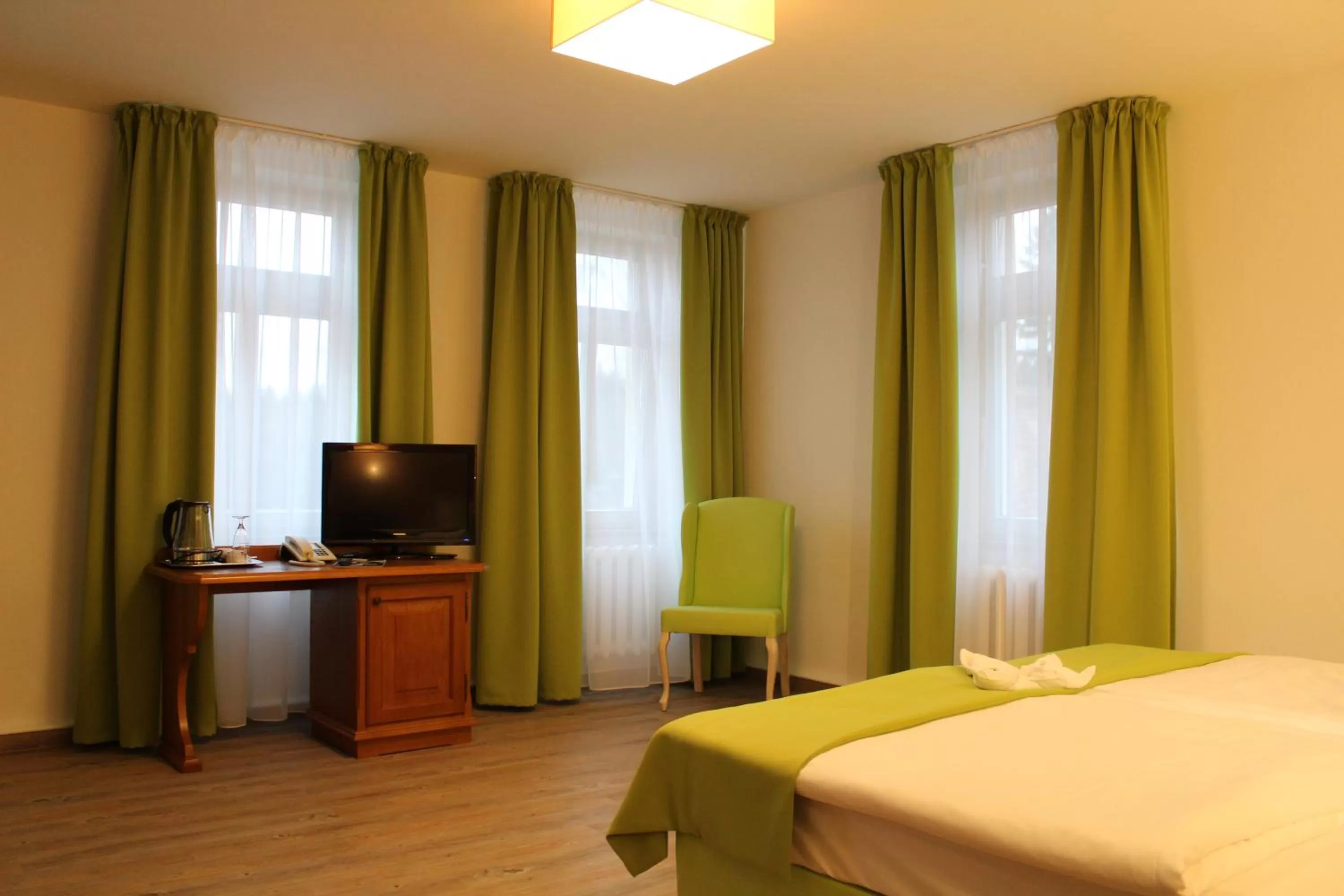 Photo of the whole room, Bed in Parkhotel Forsthaus