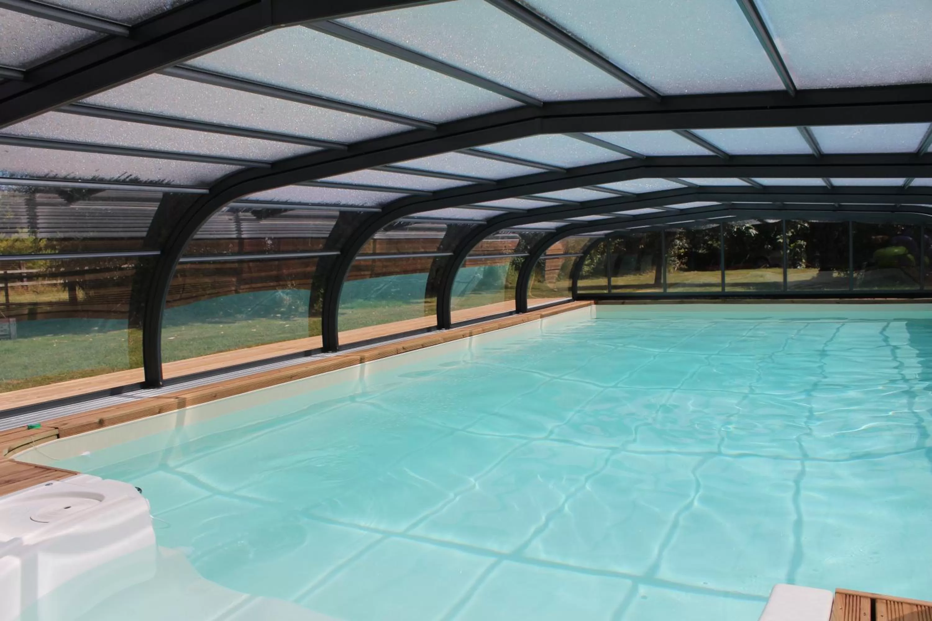 Swimming pool in Aux Agapanthes