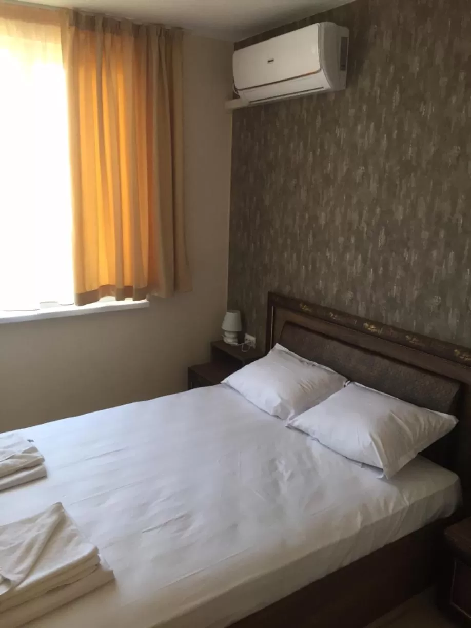 Bed in Family Hotel Malibu