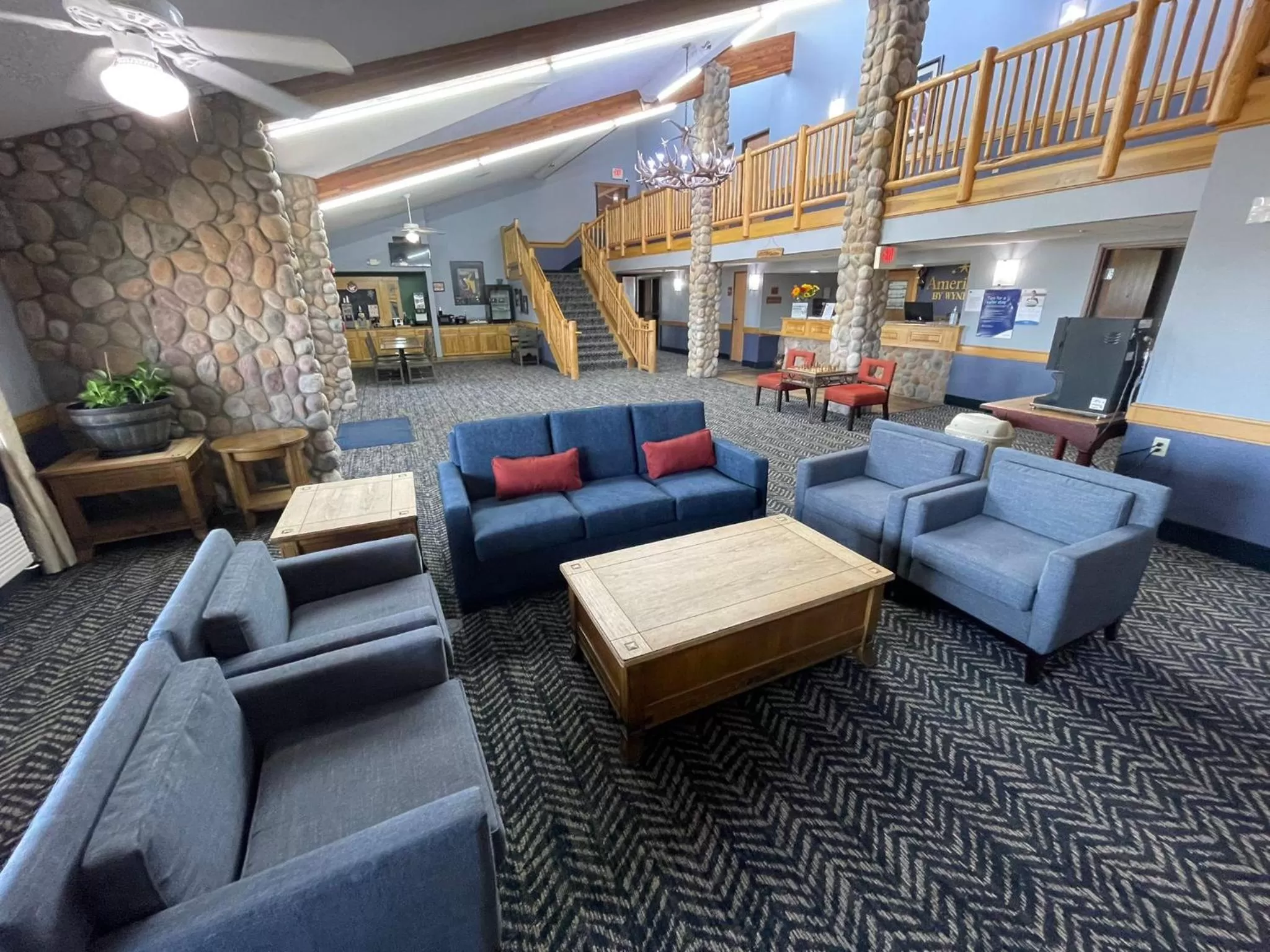 Lobby or reception in AmericInn by Wyndham Sayre