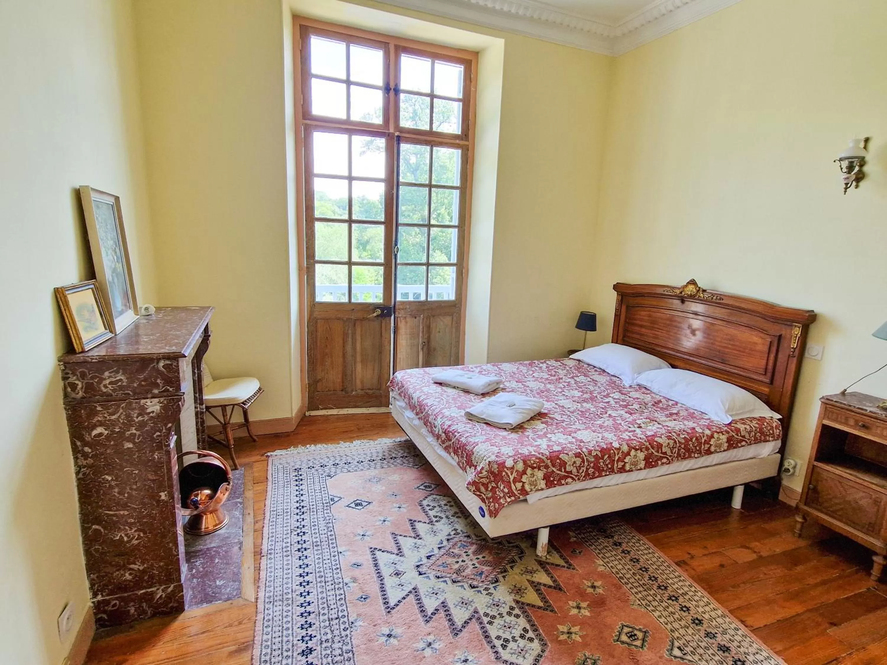 Bed in Chambres du Pont de la Légende