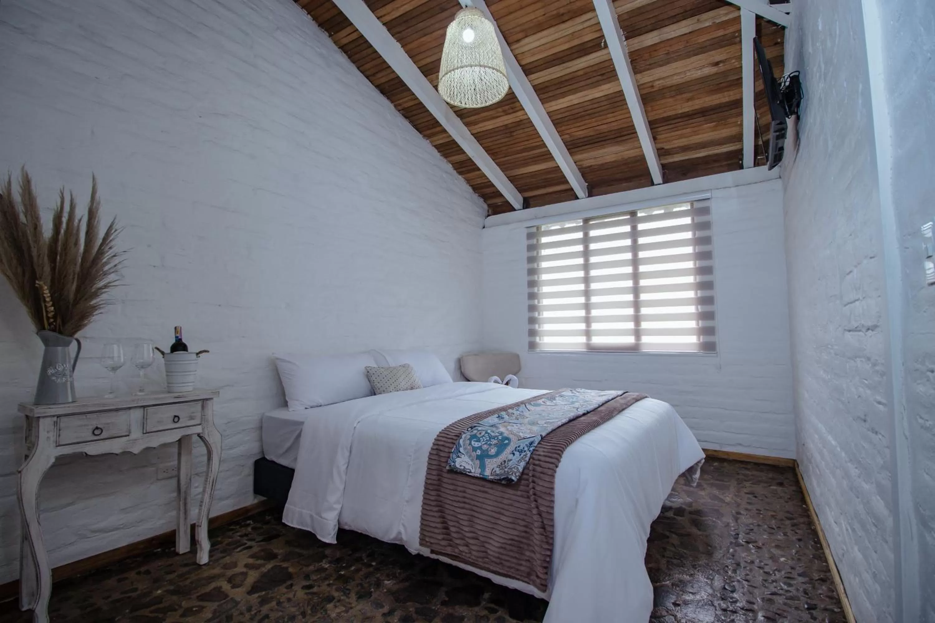 Bed in Rústic Hotel Quinta La Aurora