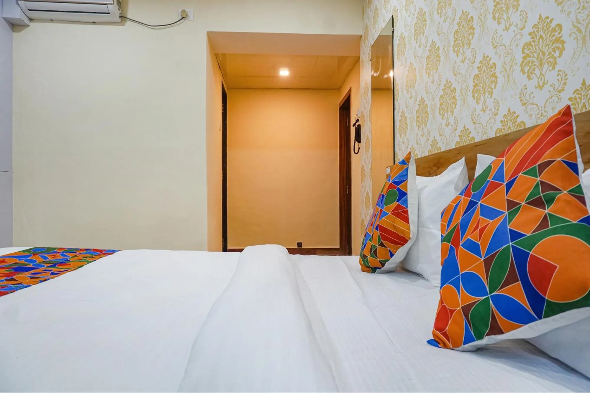 Bed in FabHotel Tan Square - Nr Eon IT Park