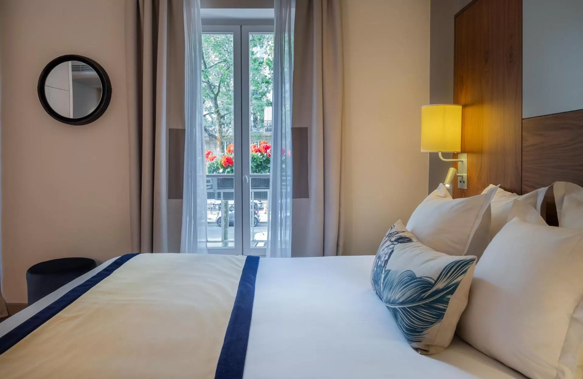 Photo of the whole room, Bed in Hôtel Le Tourville by Inwood Hotels