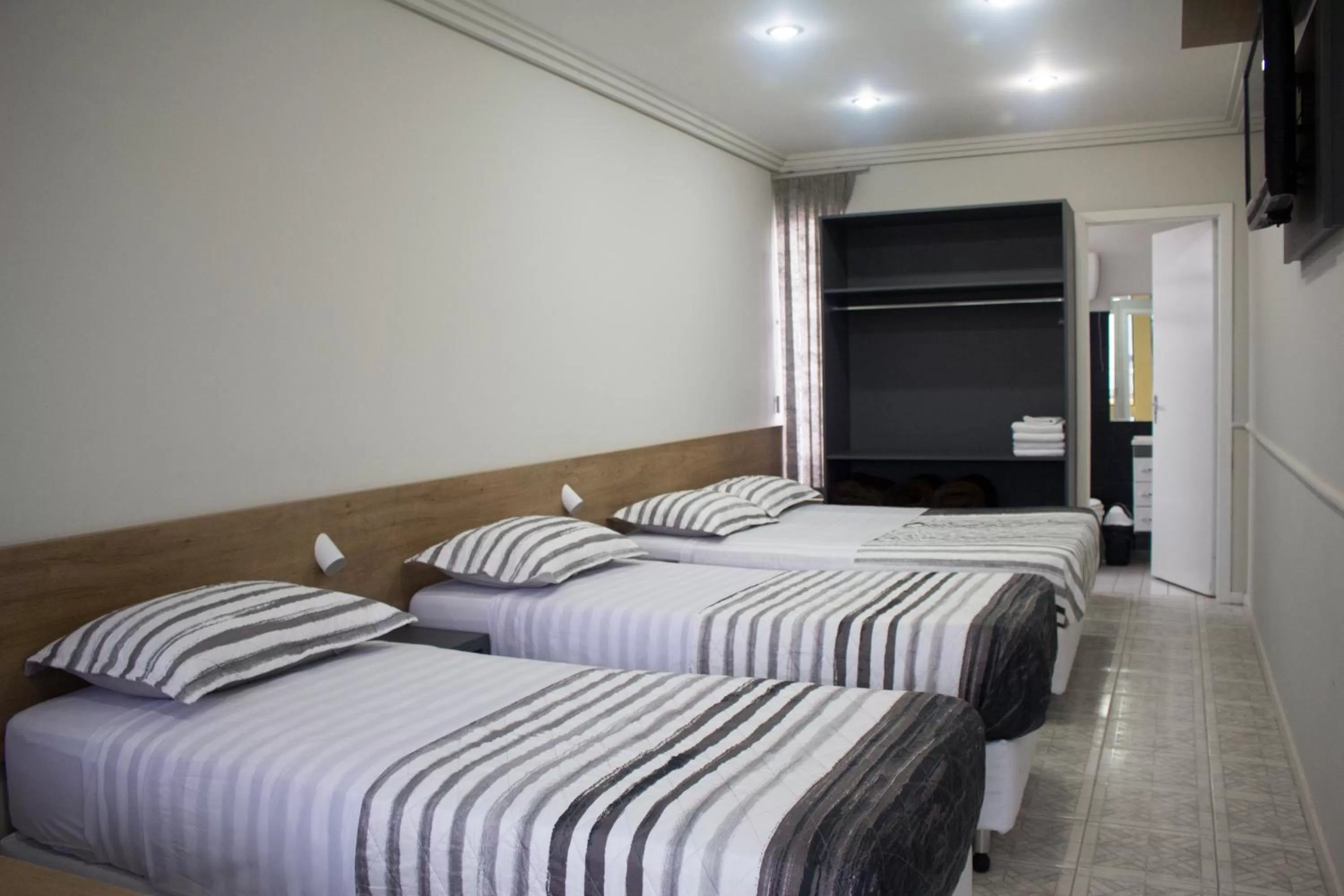 Bed in Hotel Dois Irmãos