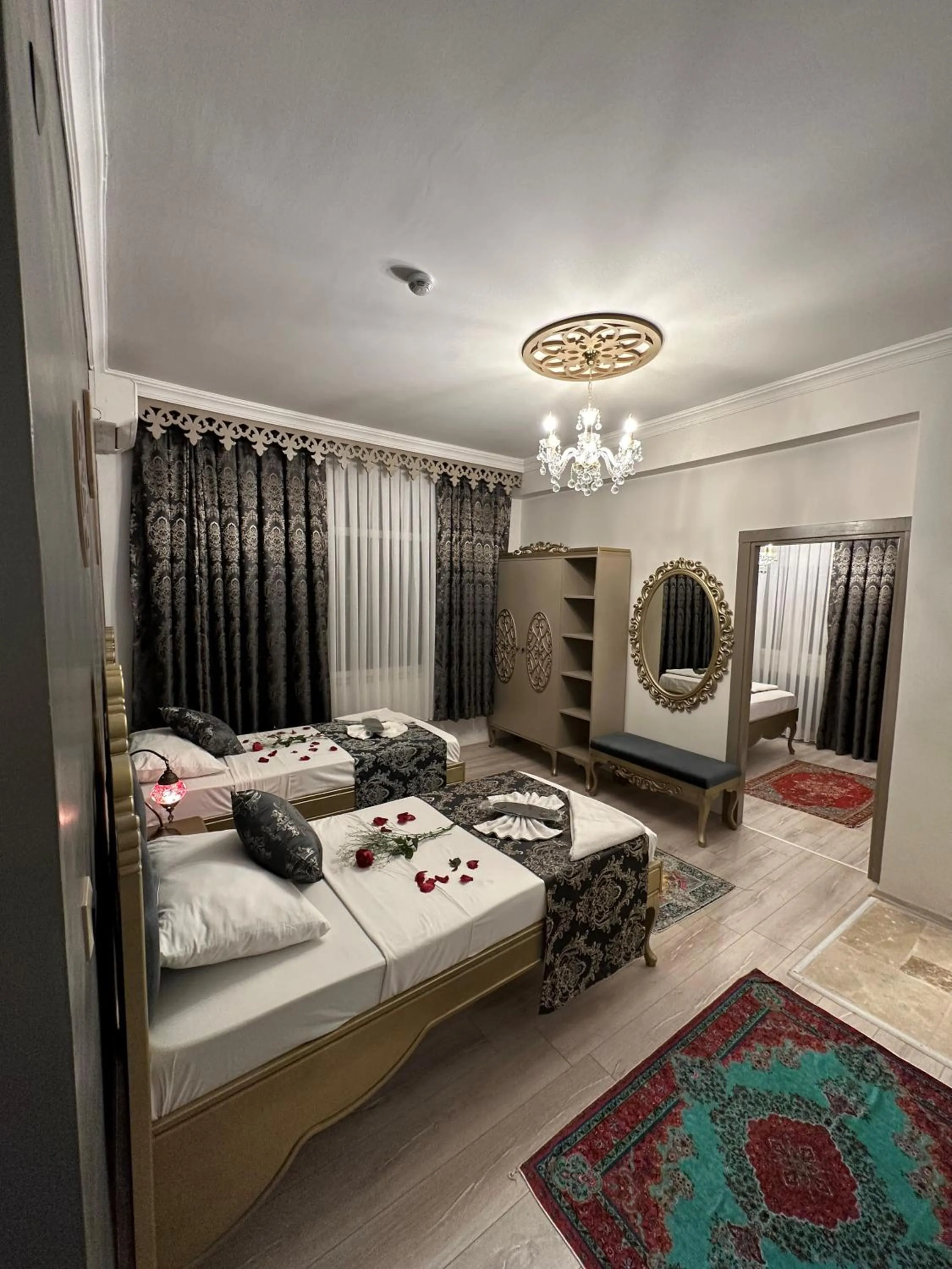 Bed in Ethnica Suites