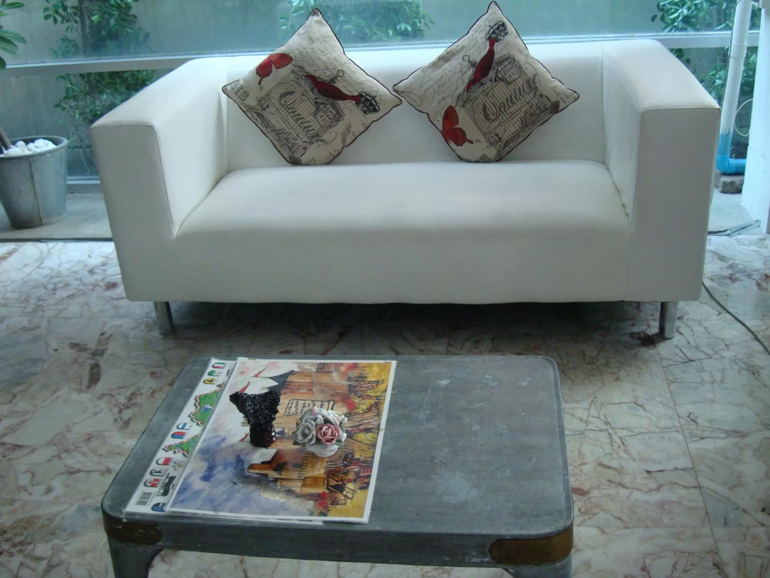 Seating area in Oriental Smile Hotel