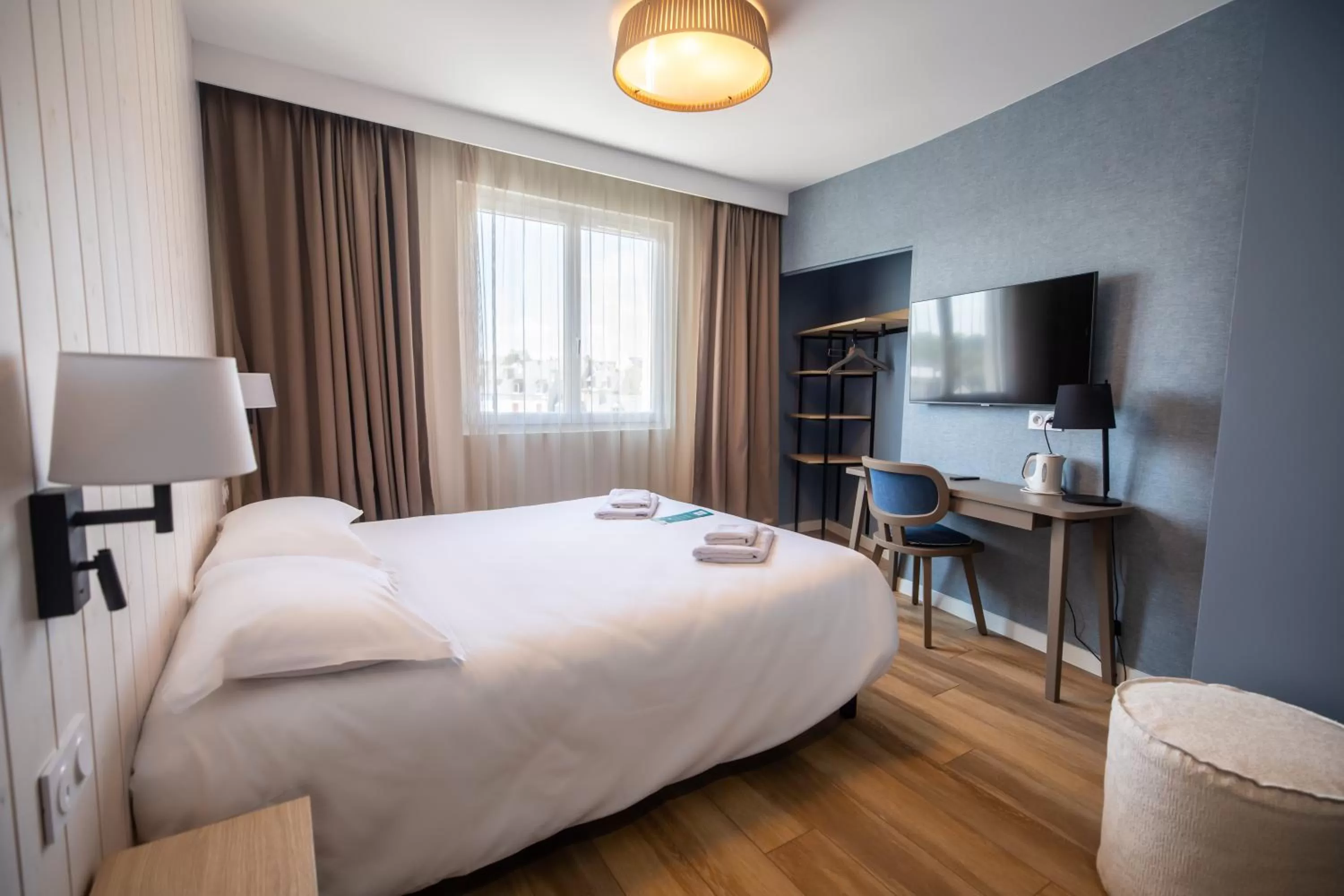 Bed in Hôtel de la Baie