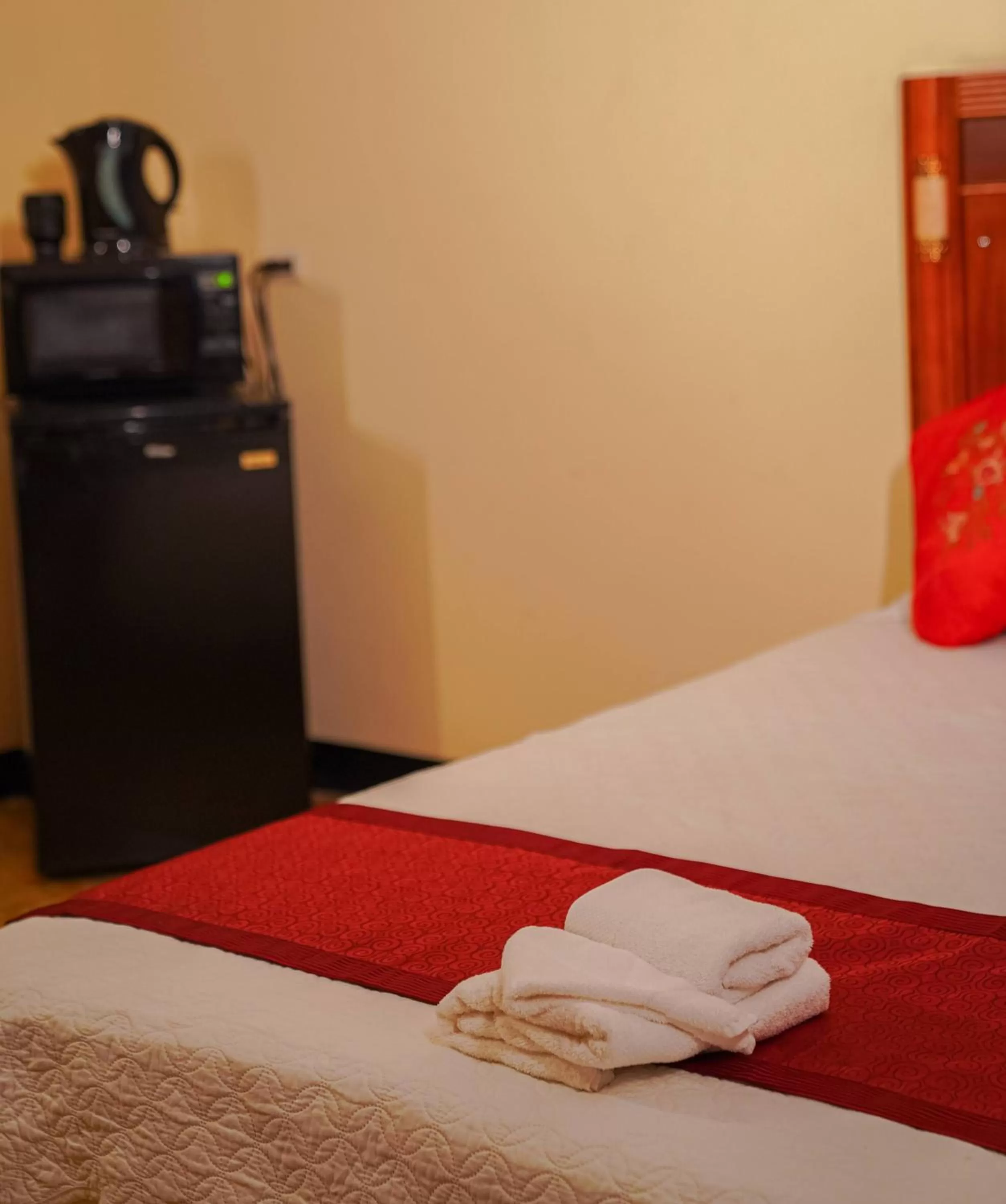 Bed in Metro Hotel Couva