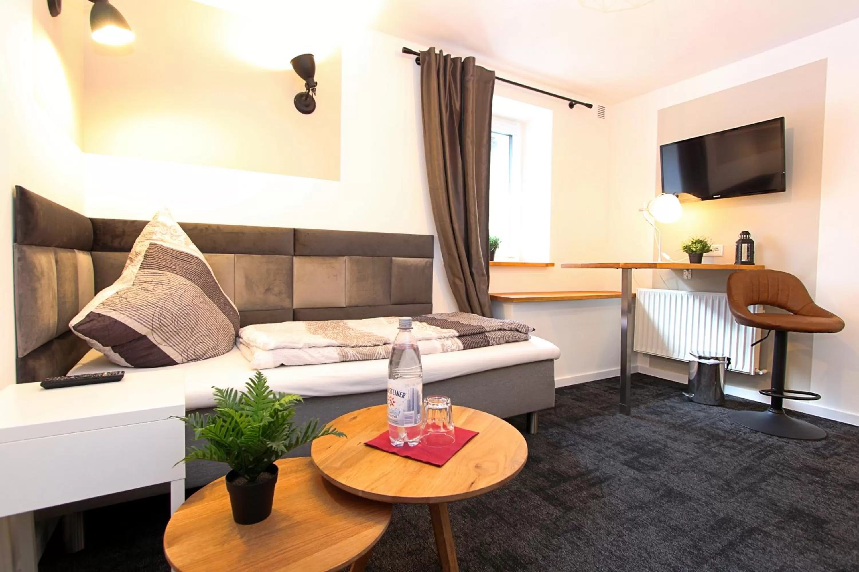 Bed, Seating Area in Hotel Burgblick