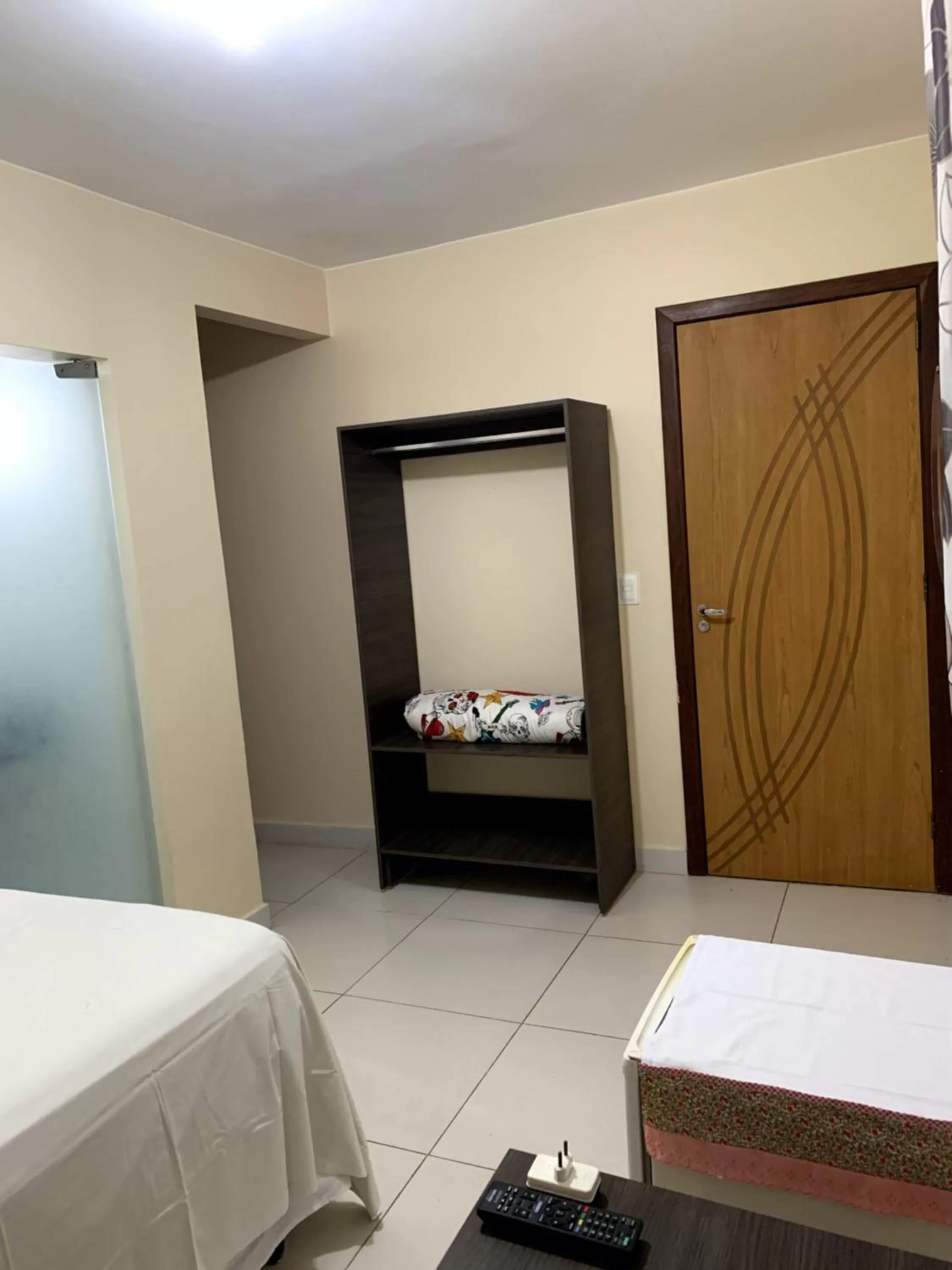 Bed in Pousada Jardim Brasília