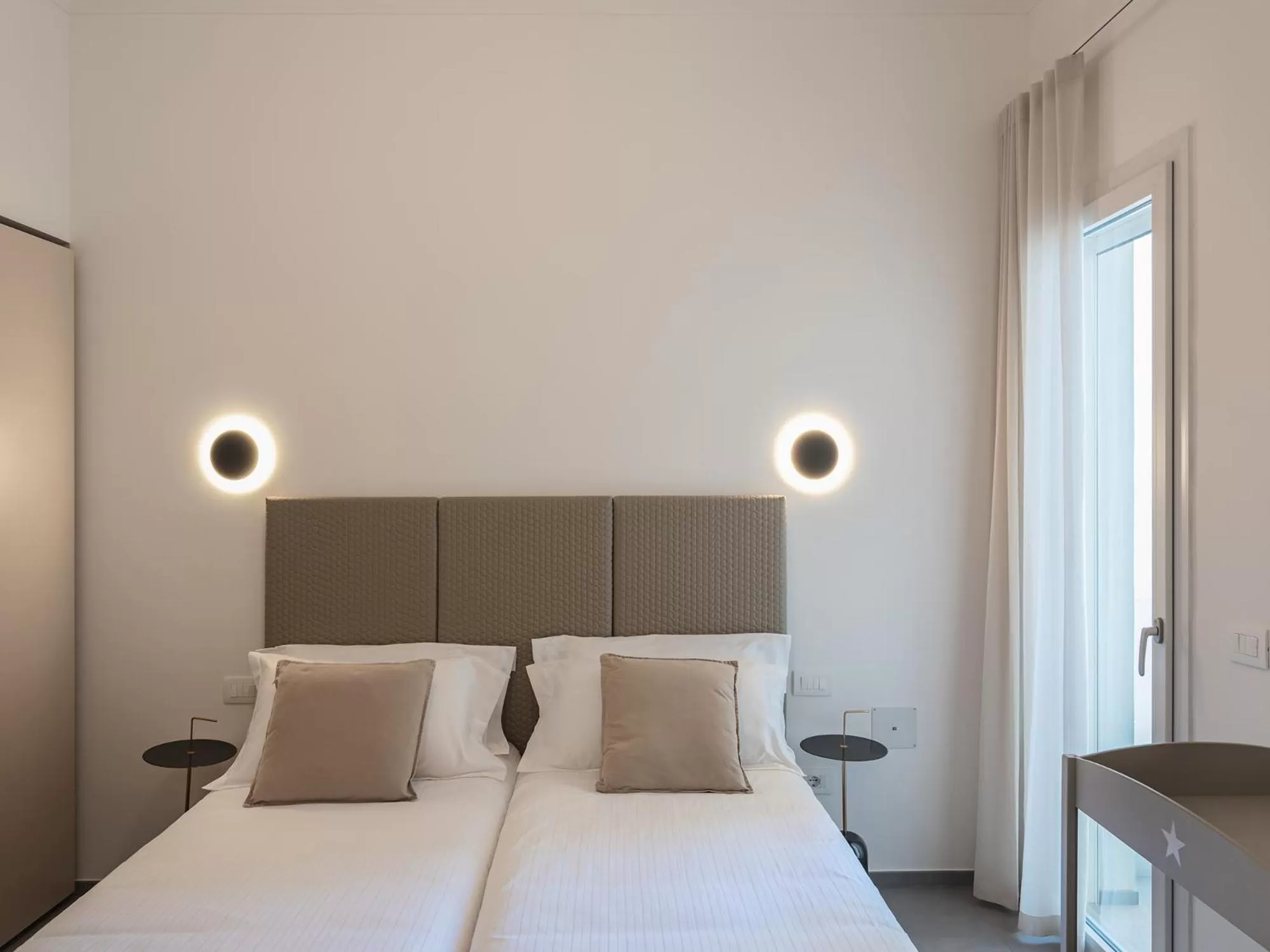 Bed in Living u HomeSuites