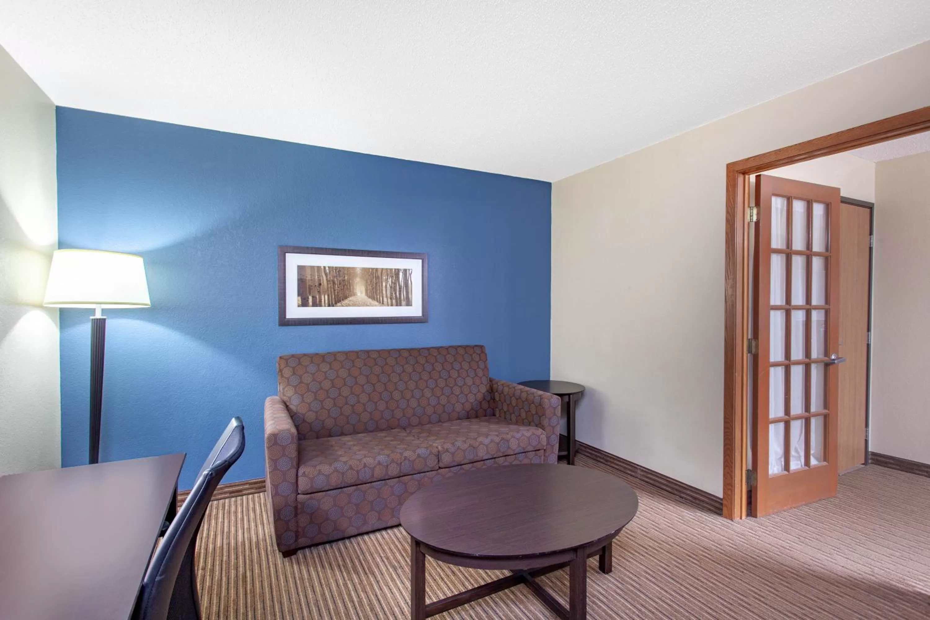 Living room in AmericInn by Wyndham Mankato Event Center near MSU