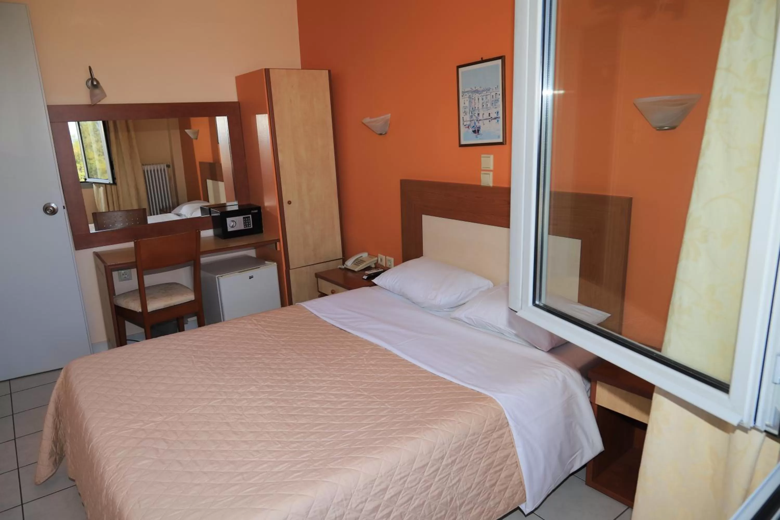 Bed in IKAROS Hotel ELLINIKO