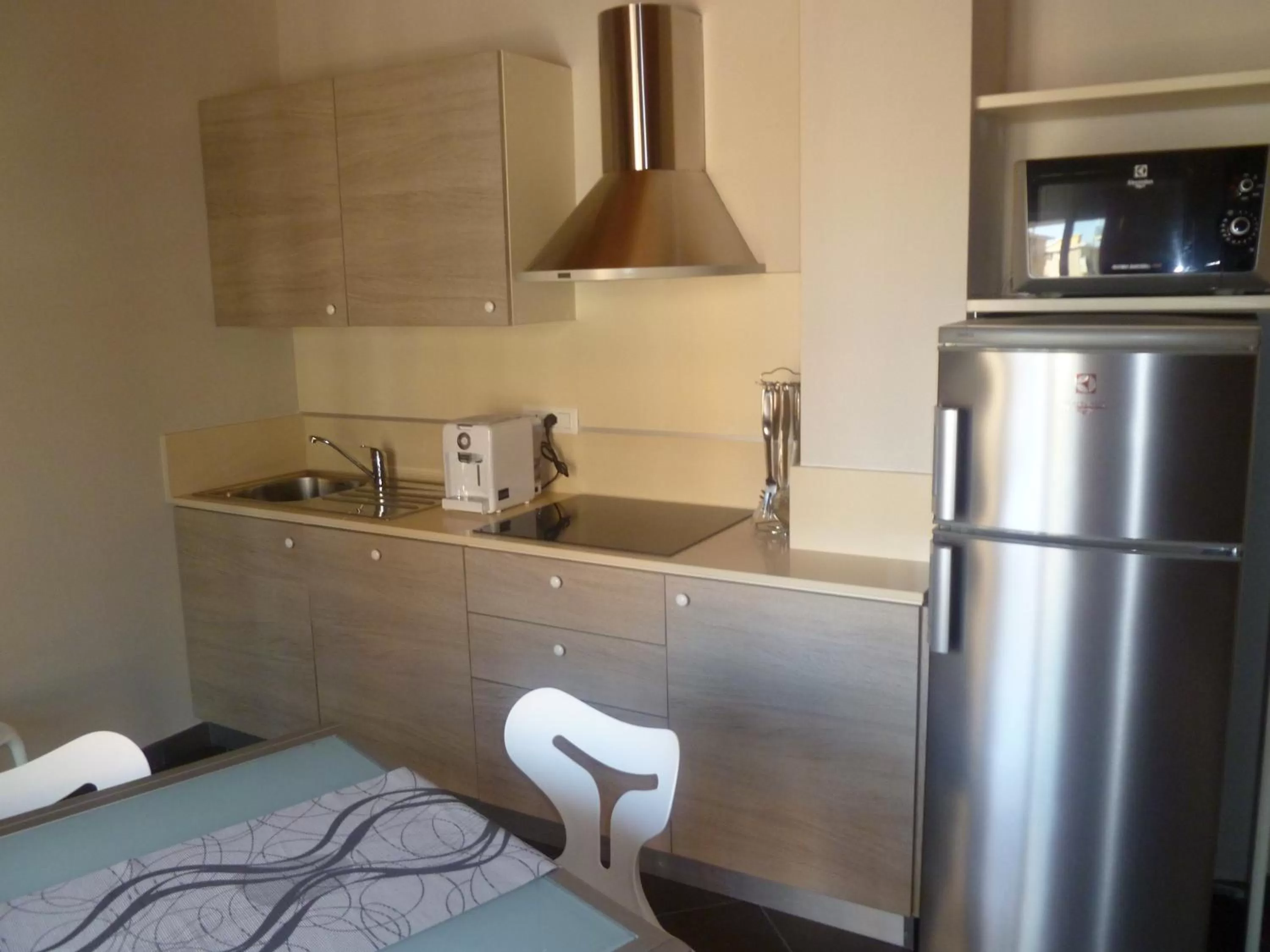 Kitchen or kitchenette, Bed in Le Vele Residence