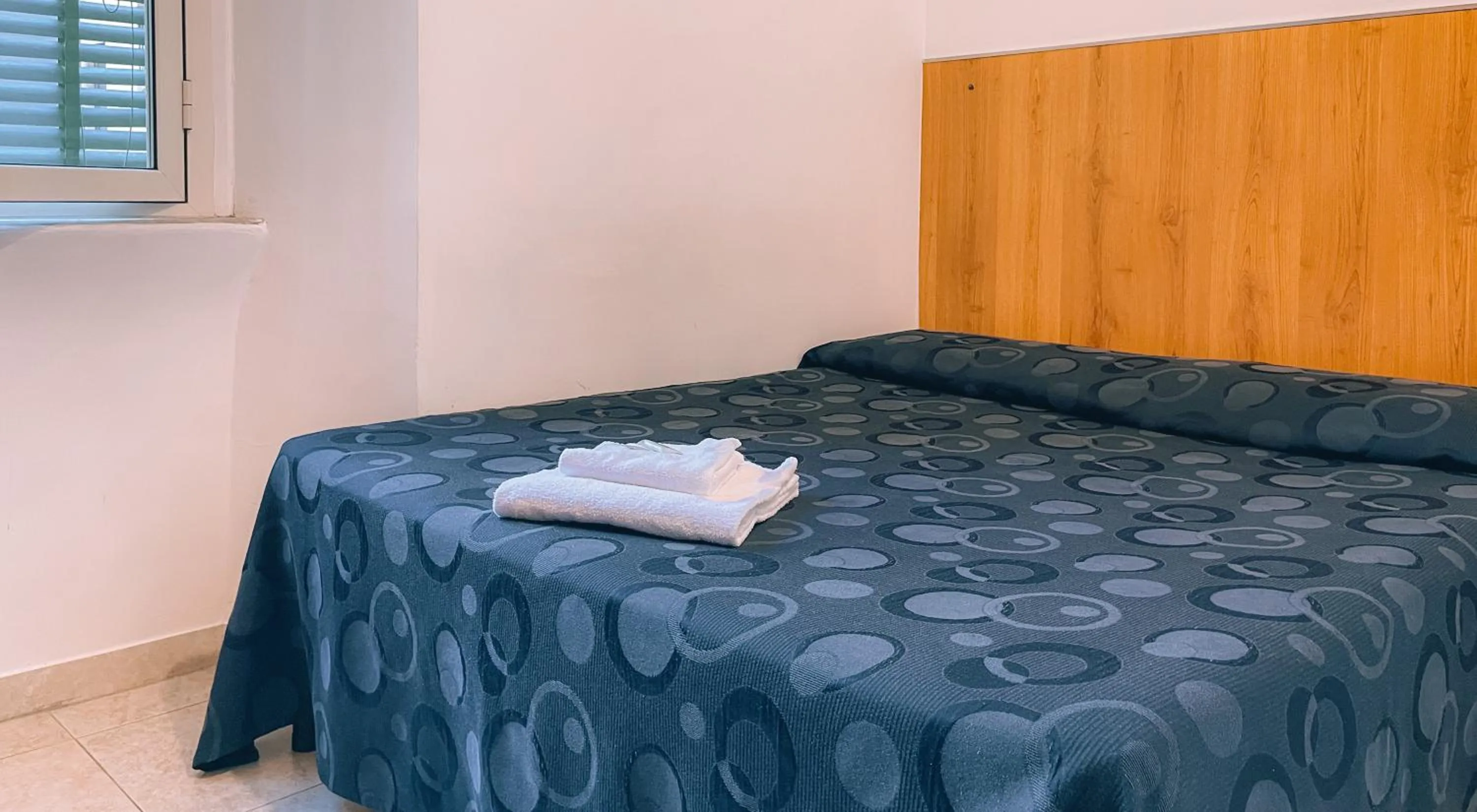 Bed in Hotel Fiorenza