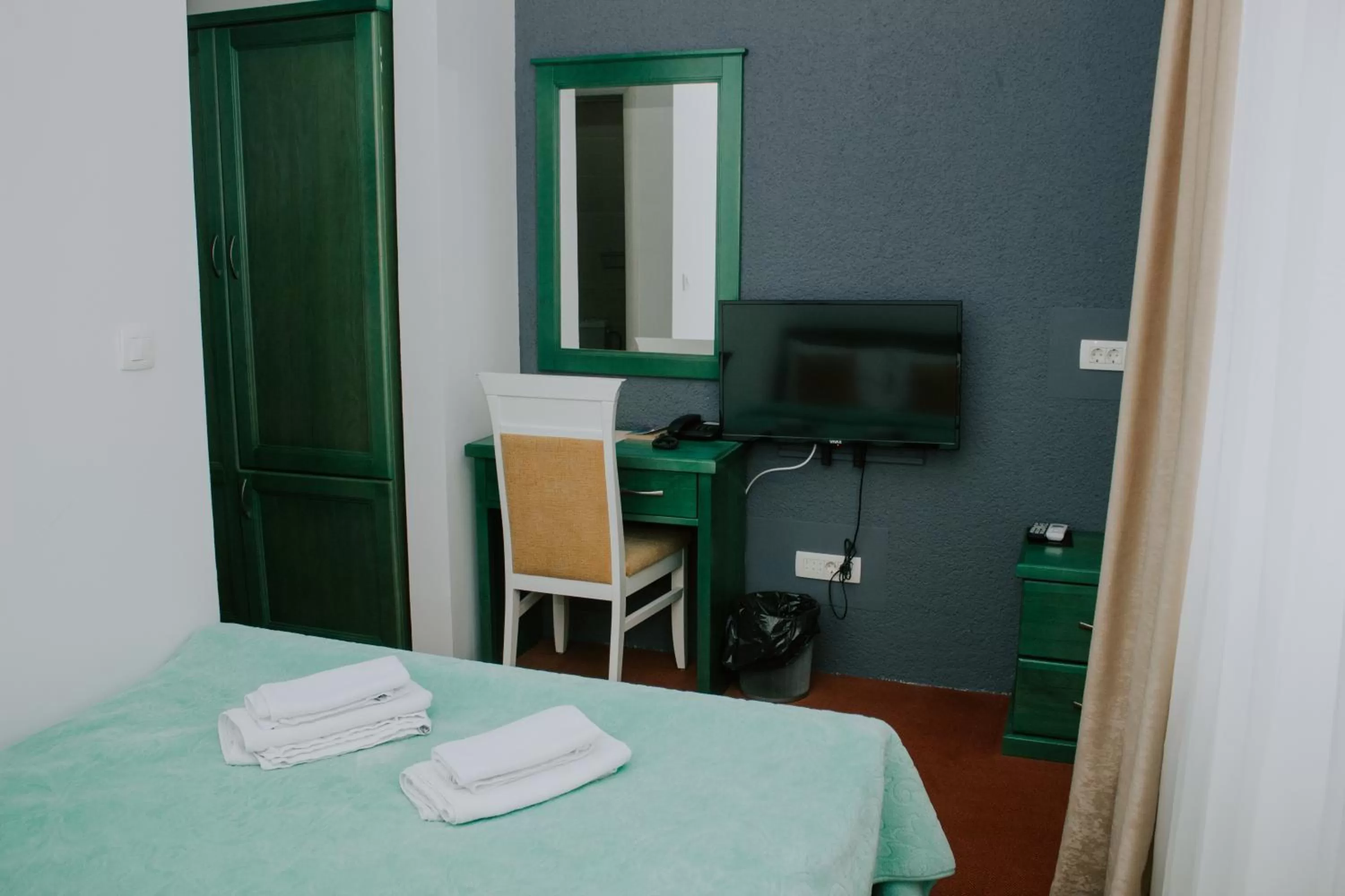 TV and multimedia, TV/Entertainment Center in Hotel Serdar