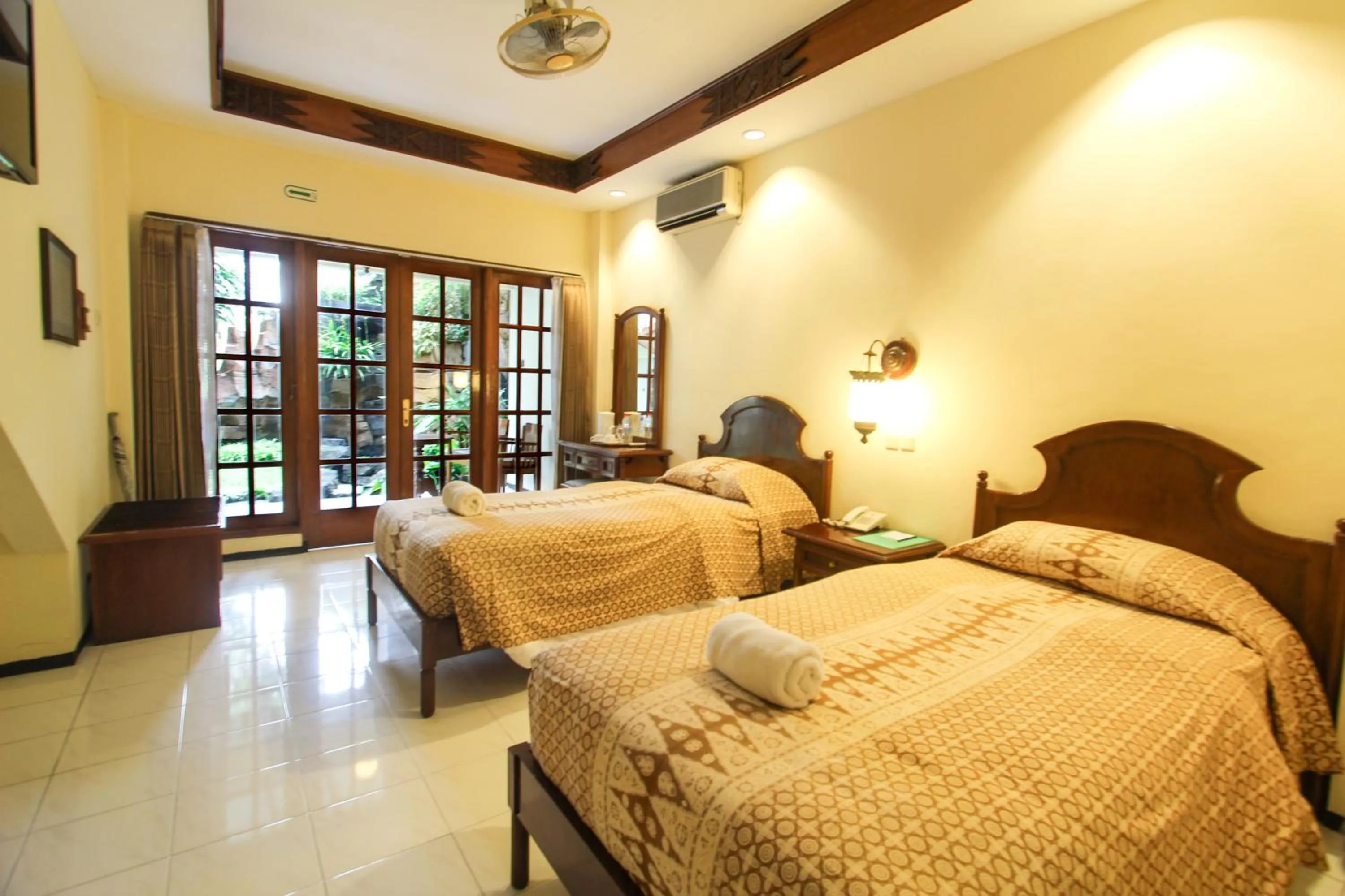 TV and multimedia, Bed in Duta Garden Hotel