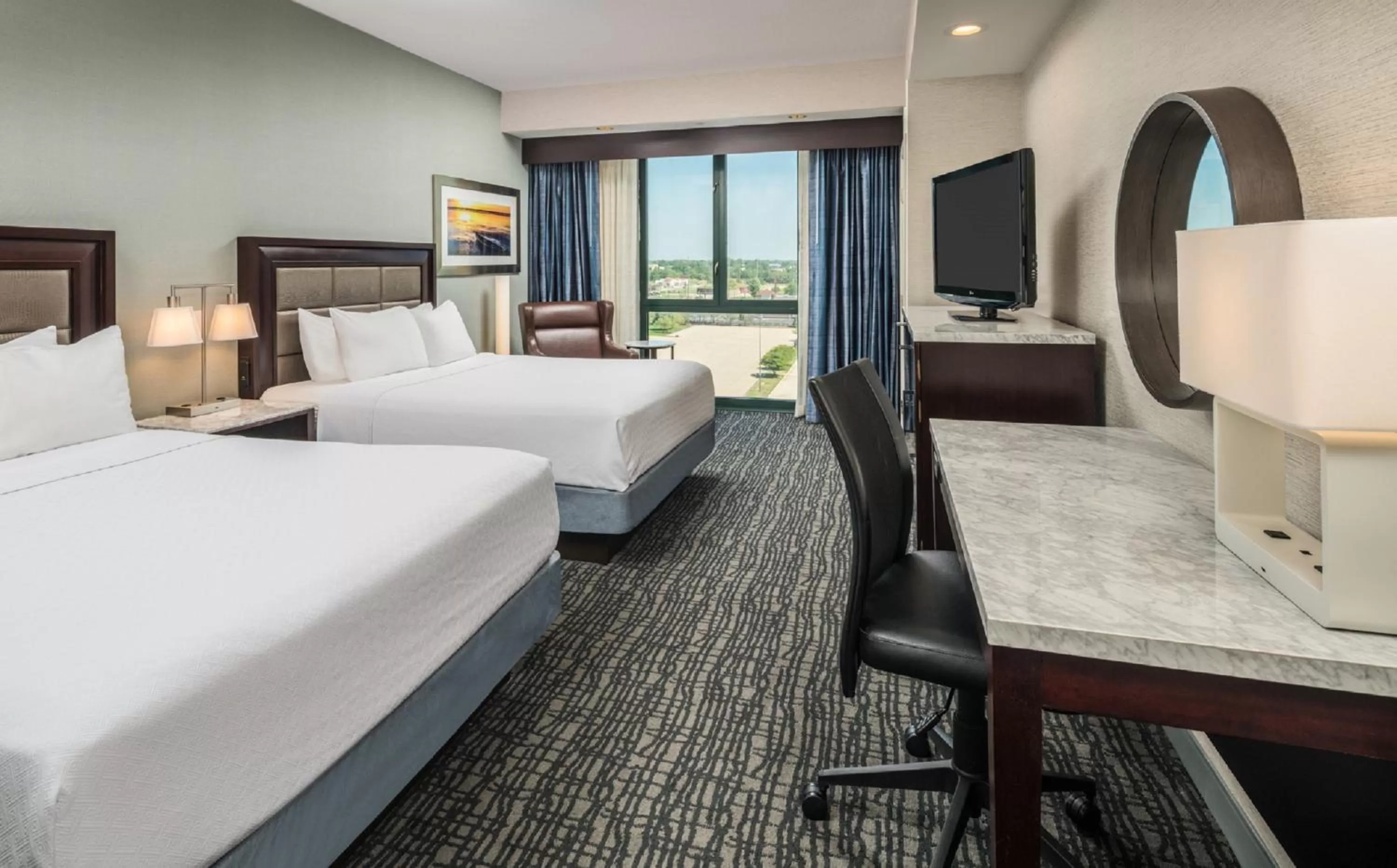 Photo of the whole room, Bed in Crowne Plaza Springfield Convention Center by IHG