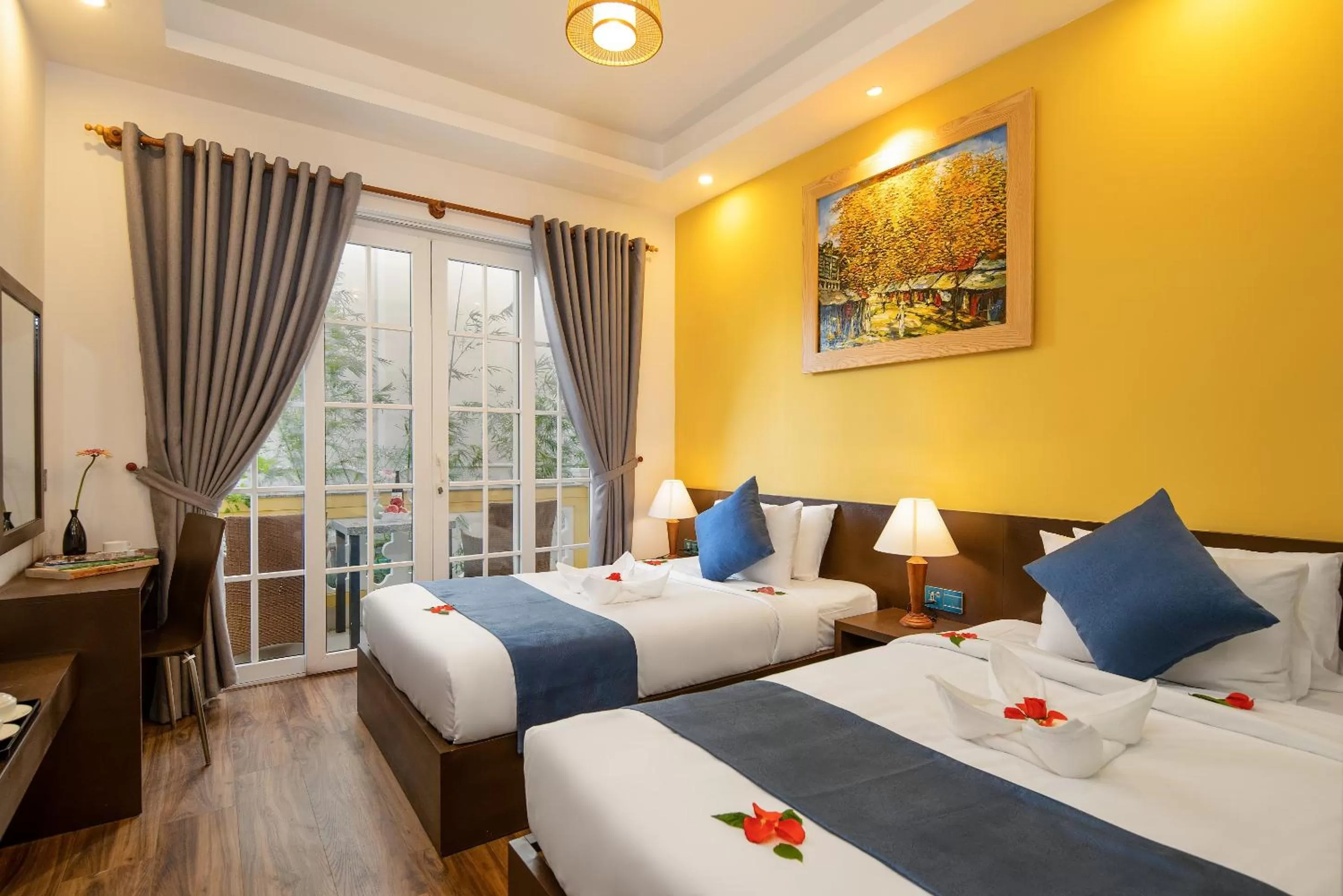 Photo of the whole room, Bed in TRIPLE Riverside Villa Hotel HoiAn