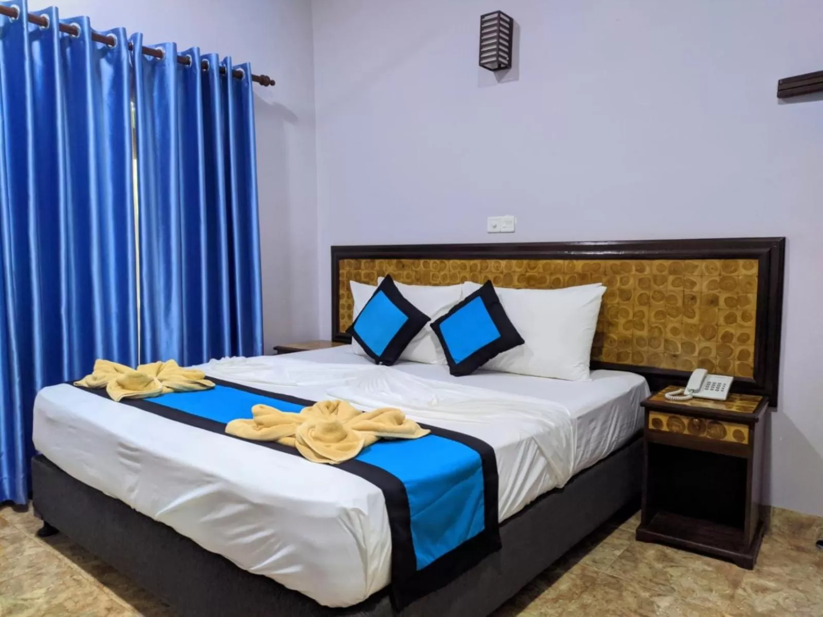 Bed in Blue Sand Beach Resort