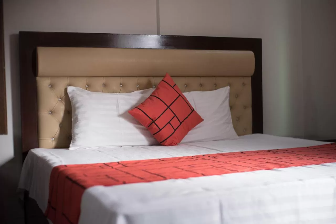 Bed in GOHO Rooms Badar