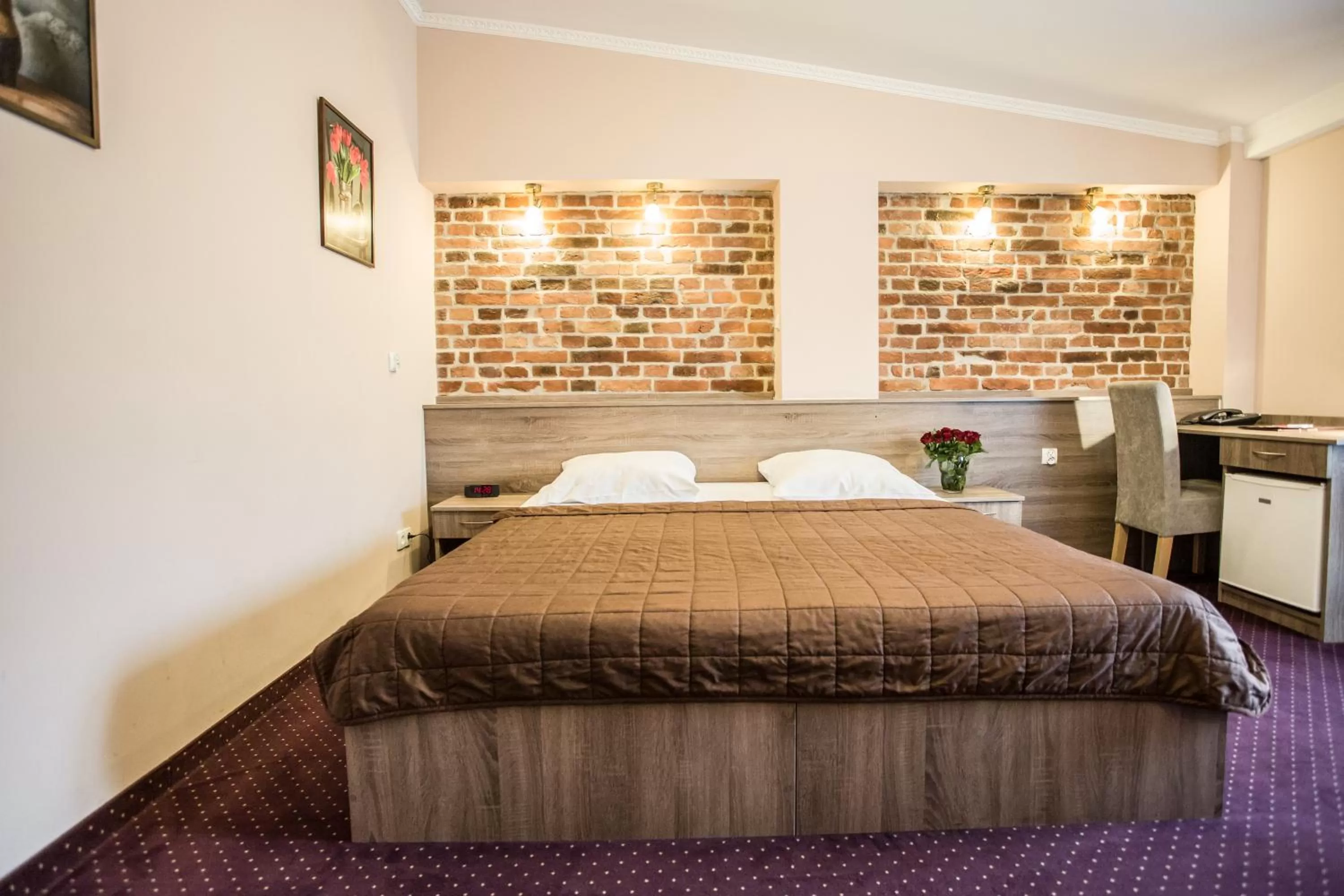 Bed in Hotel Maksymilian