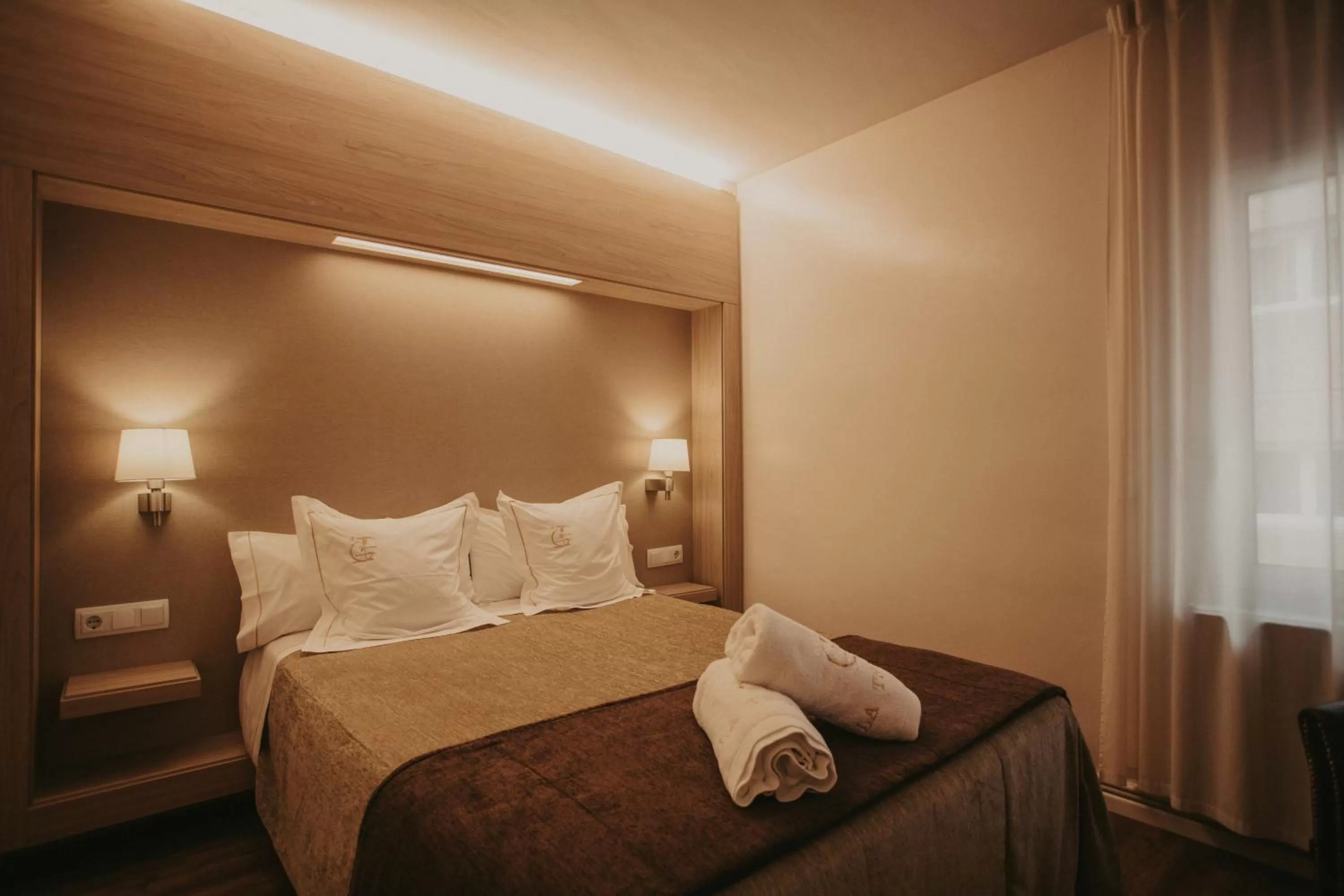 Bed in La Trobada Hotel Boutique