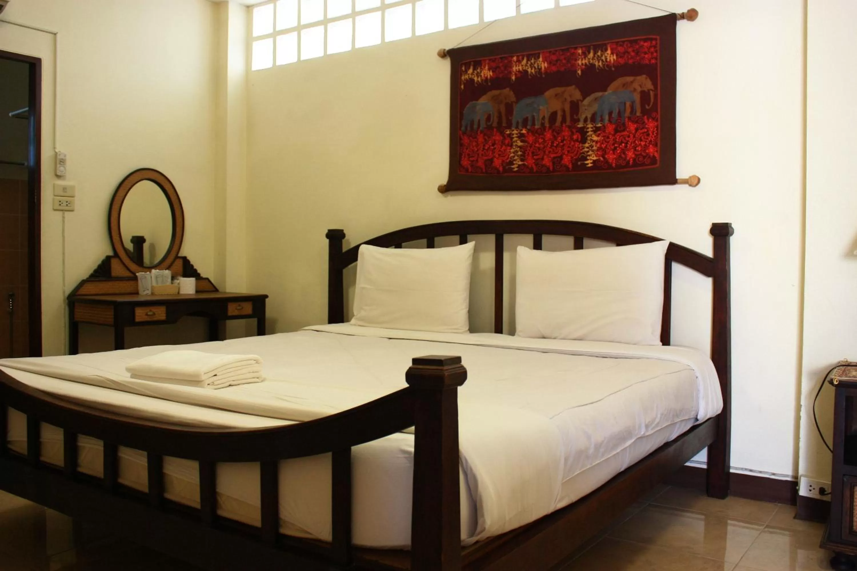 Bed in โรงแรมตีฆ้อง - Tri Gong Hotel