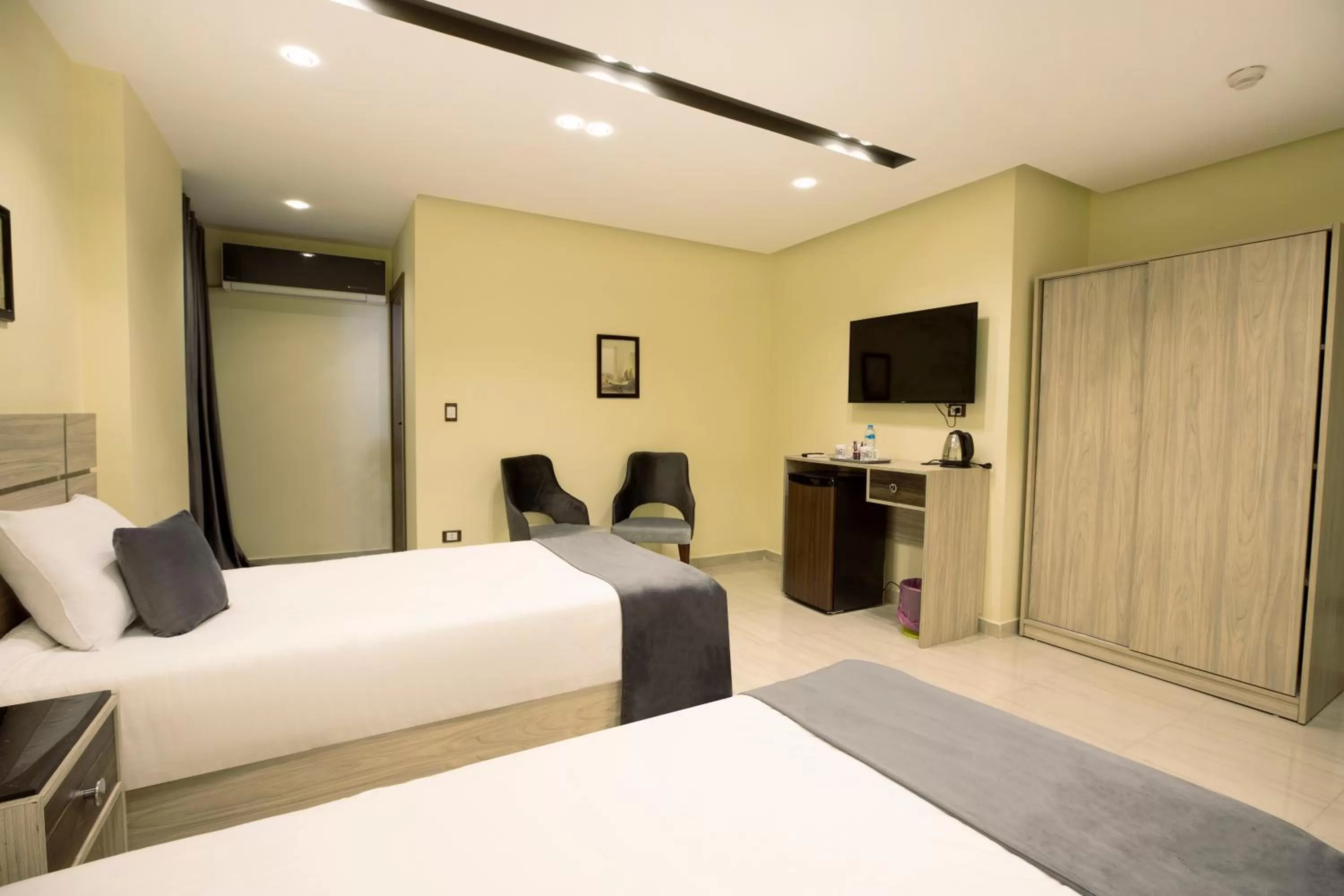 Bed in Brothers Pyramids View Hotel