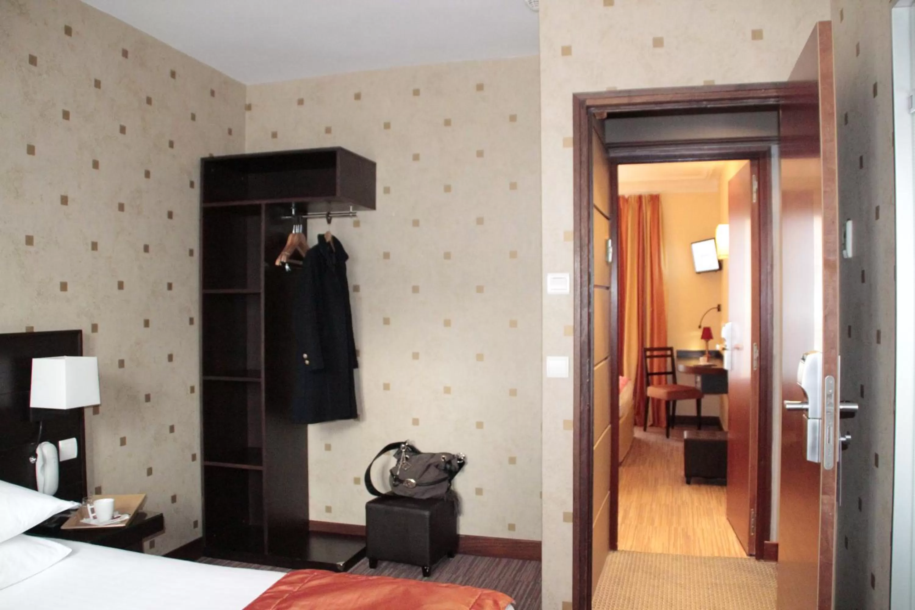Photo of the whole room, Bed in Hôtel de l'Exposition - Tour Eiffel