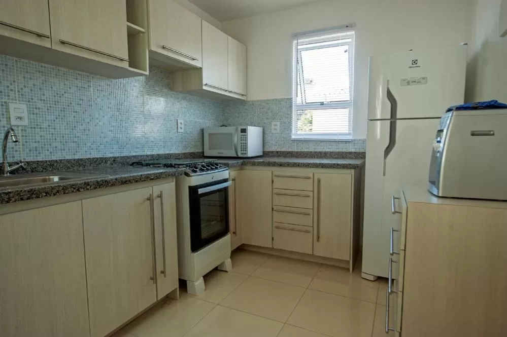 Kitchen/Kitchenette in Manga Verde Beach Residence