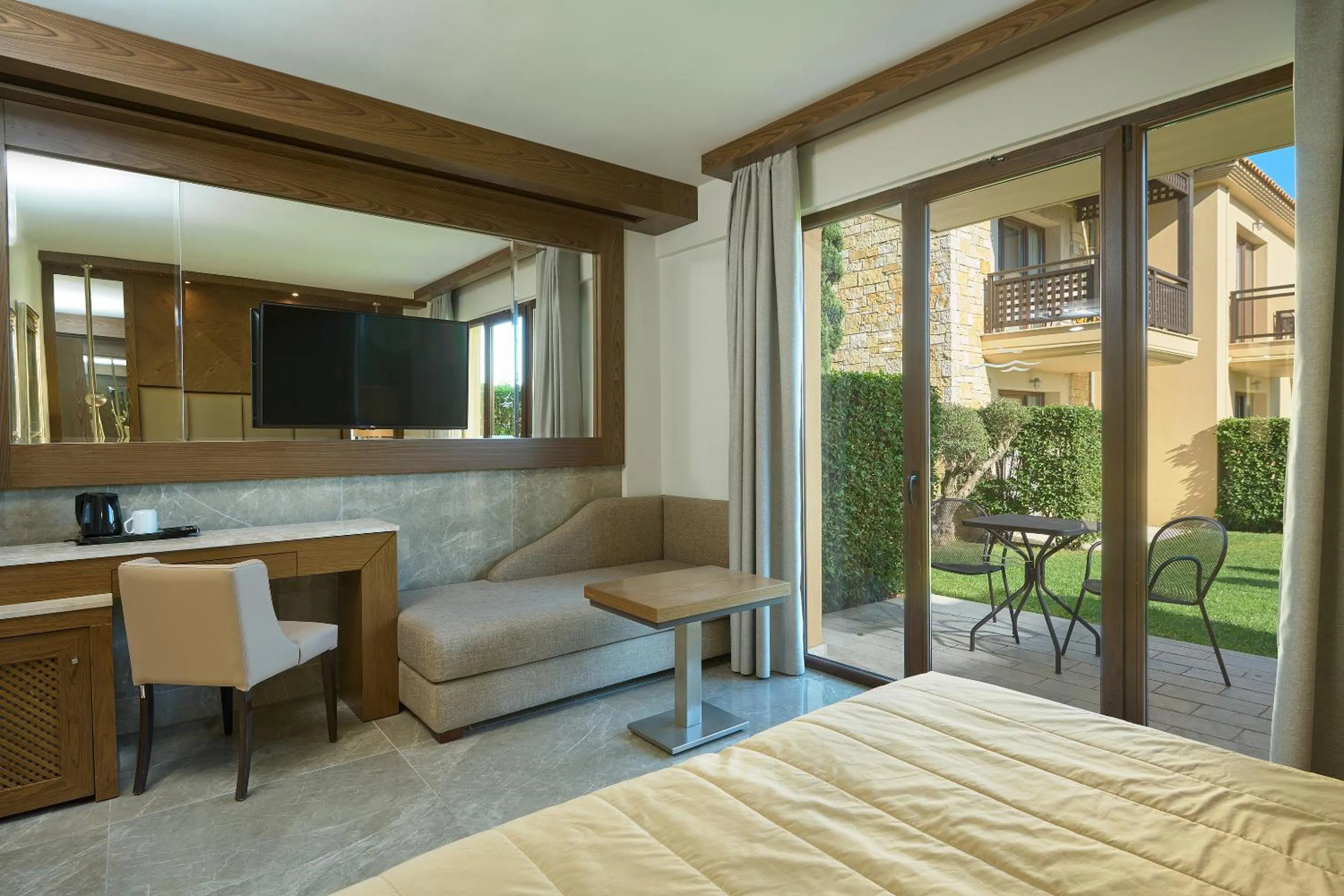 Patio, Bed in Mediterranean Village Hotel & Spa