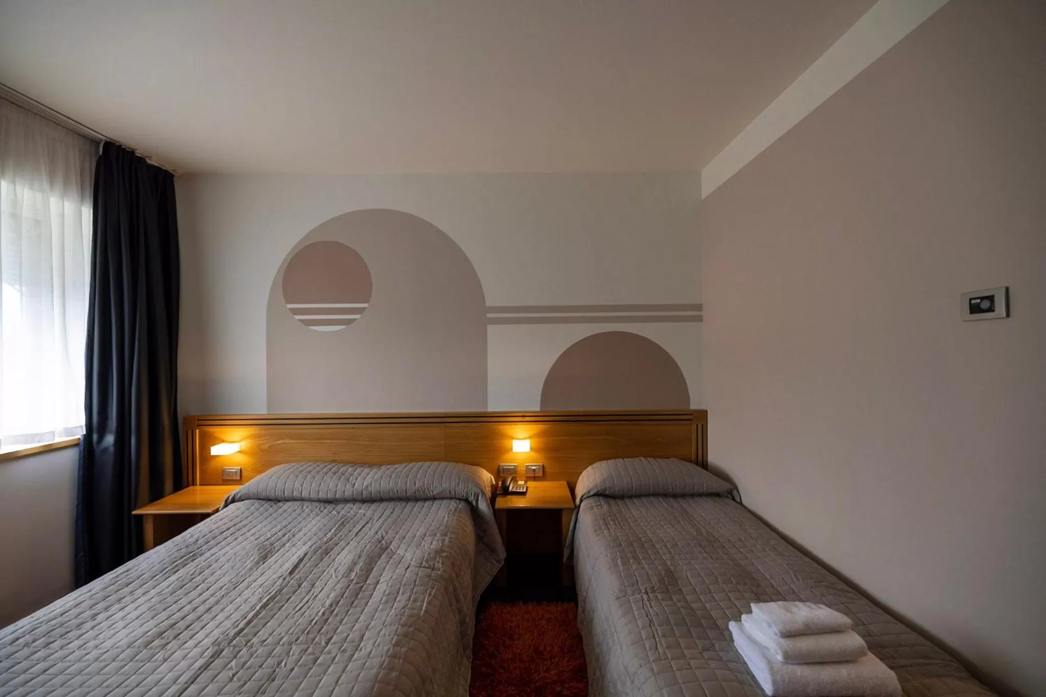 Bed in Hotel Europa Belluno