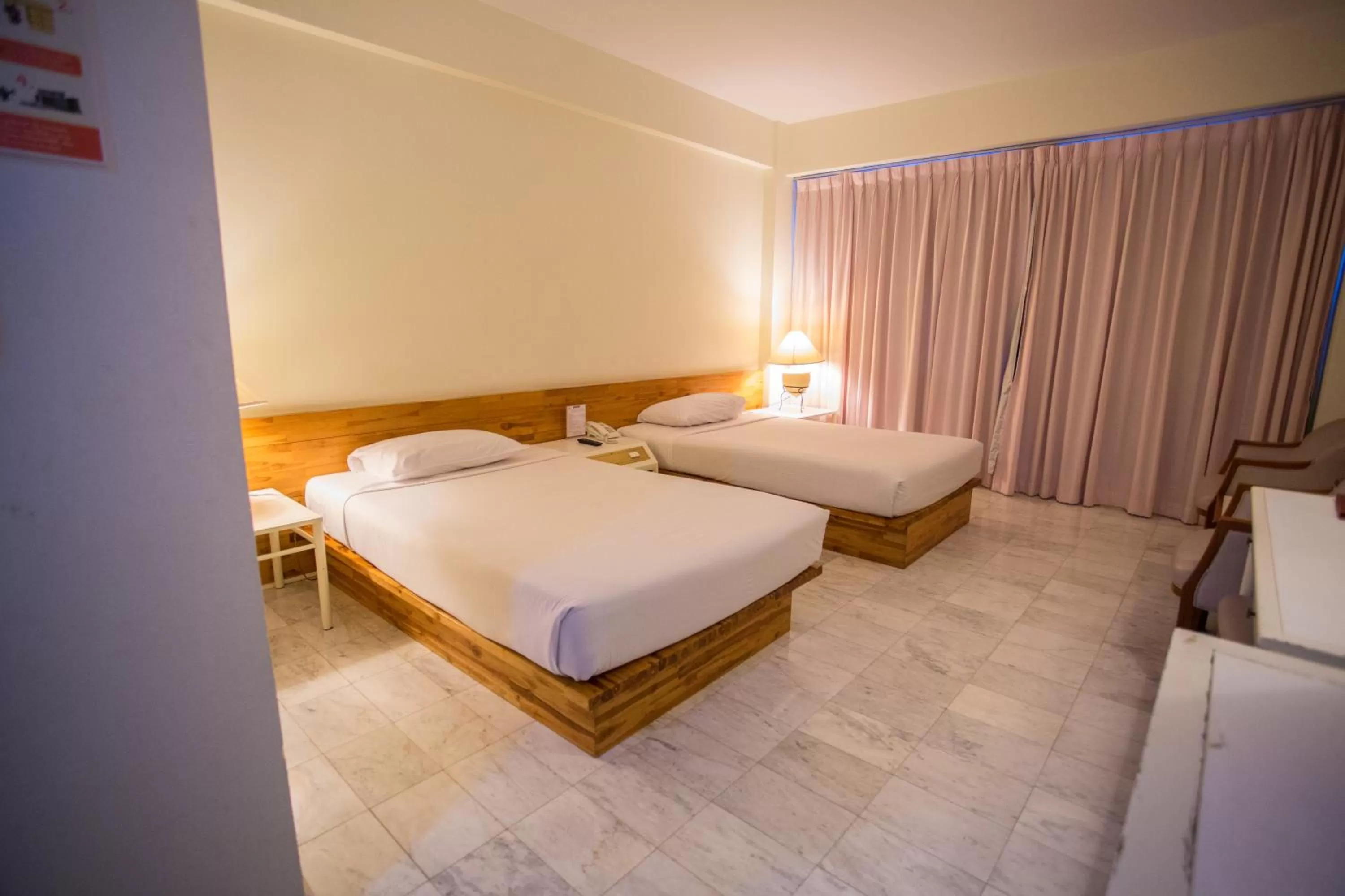 Bed in Seeharaj Hotel