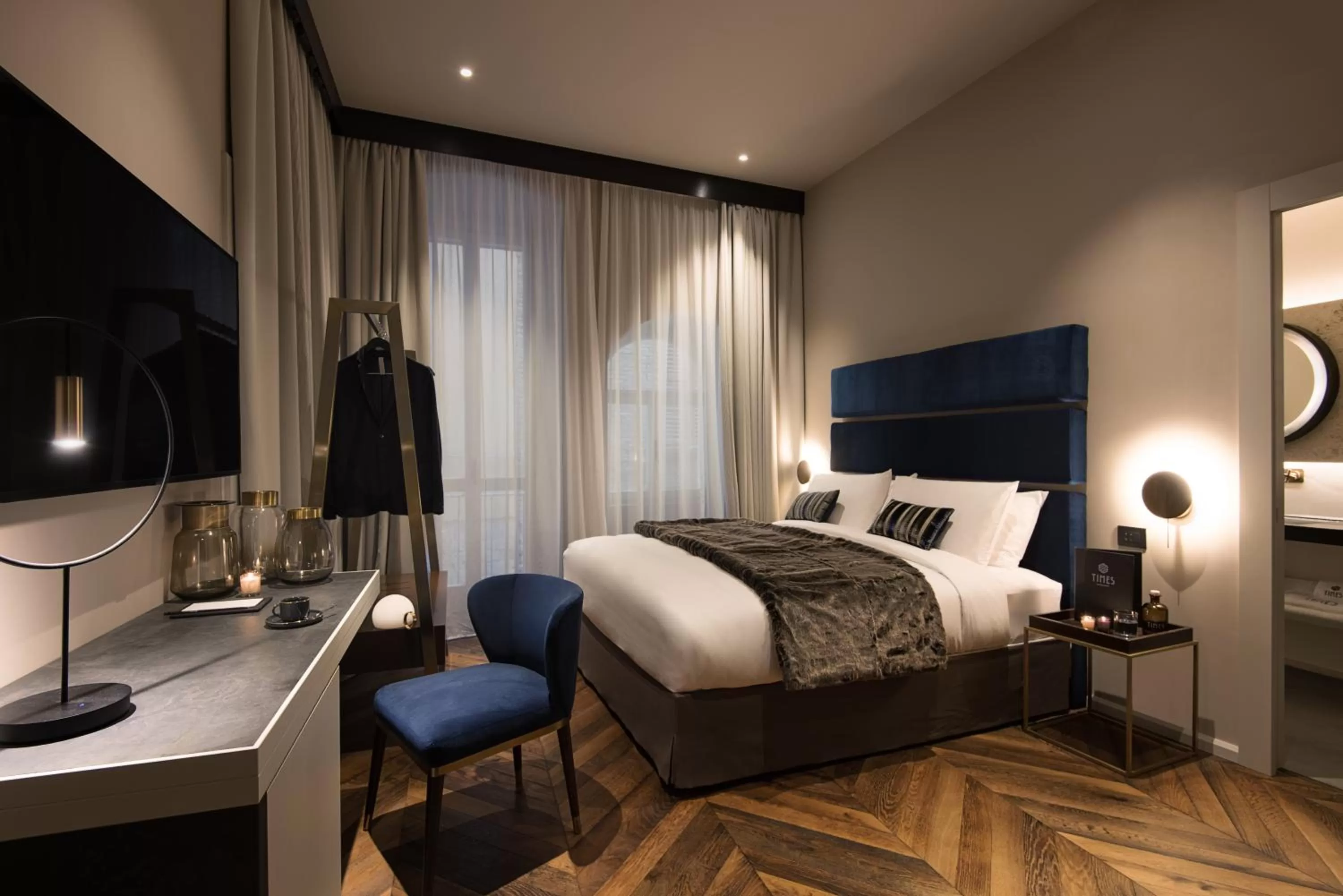 Bed in Times Suites - Guesthouse