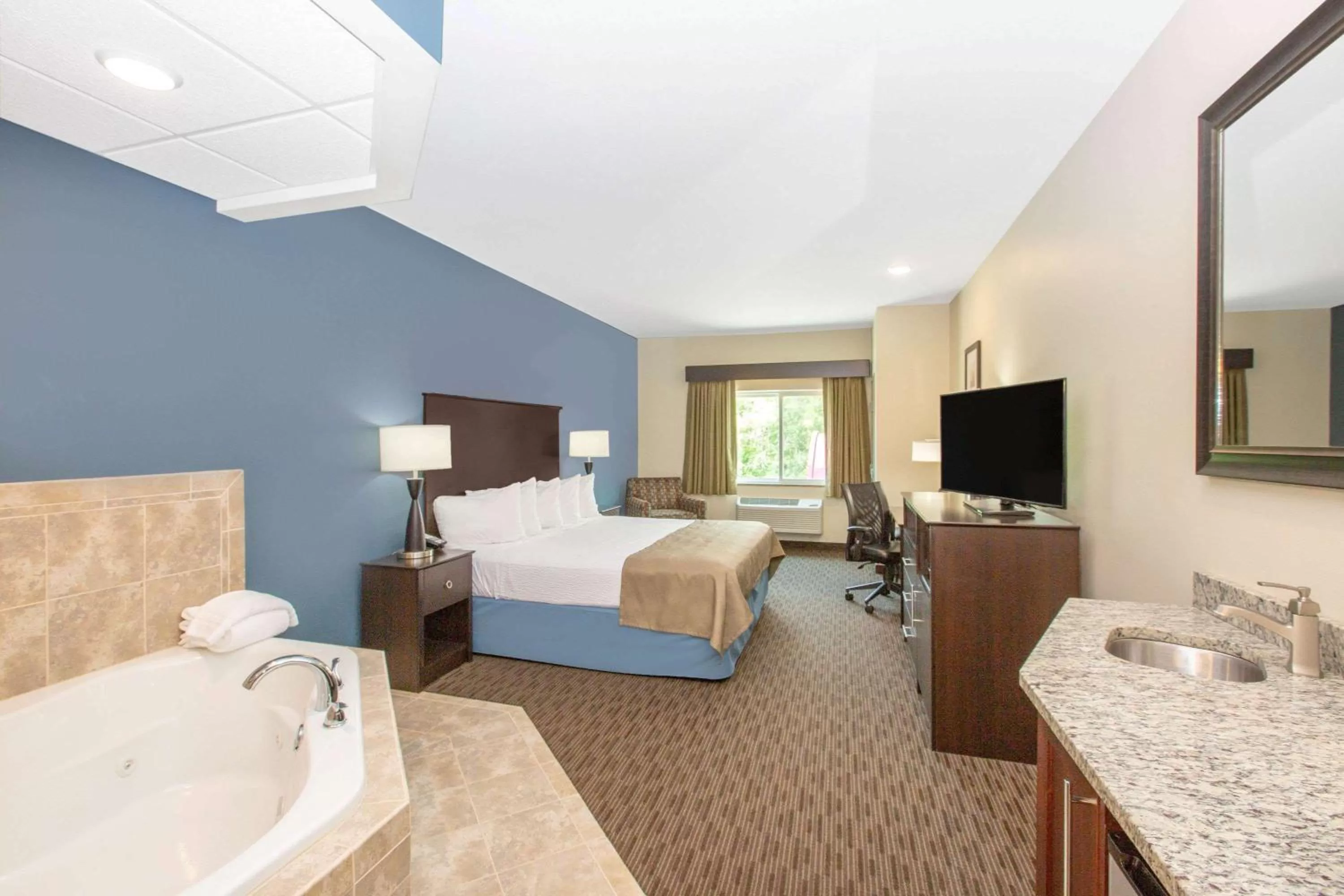 Photo of the whole room, Bed in AmericInn by Wyndham Humboldt