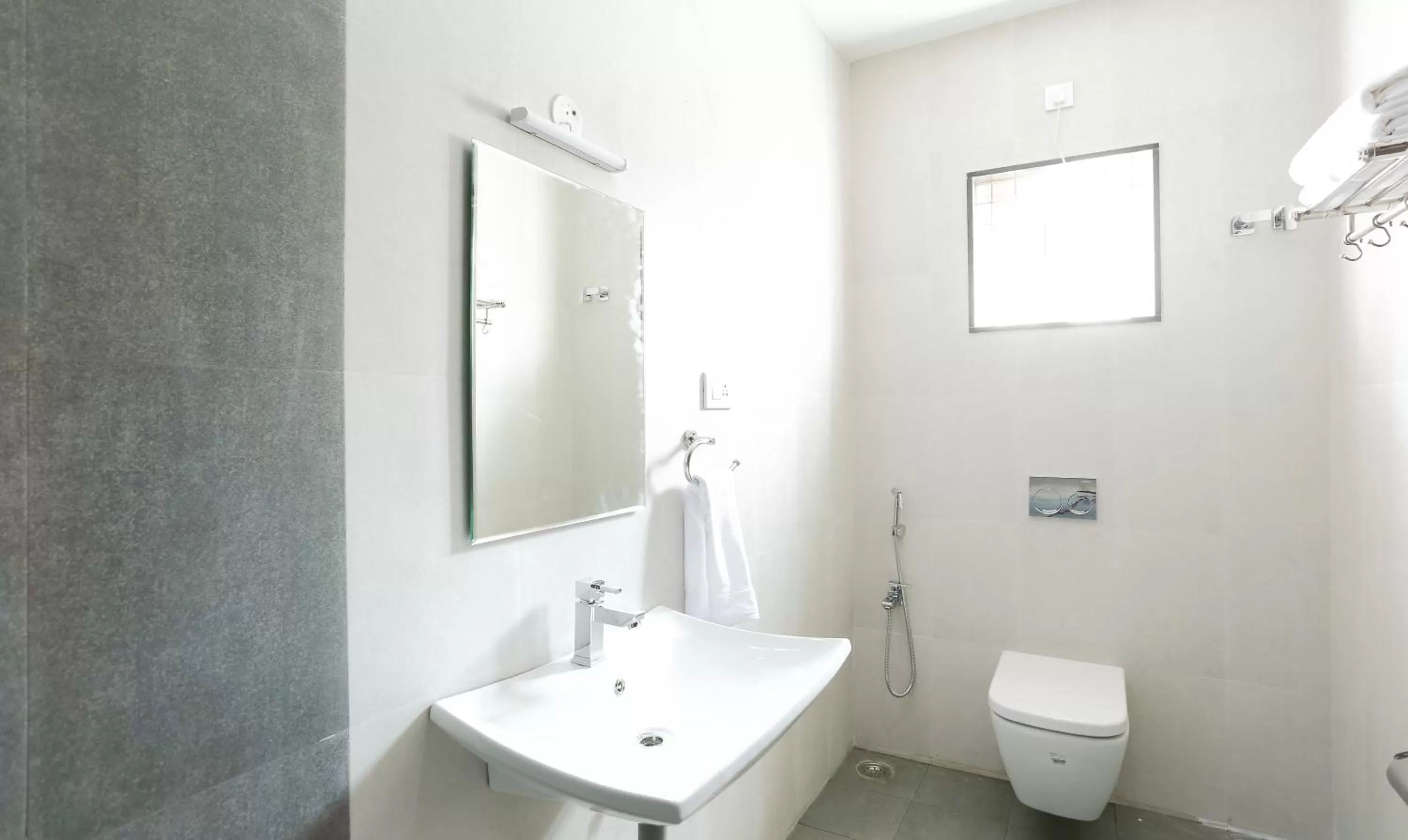 Bathroom in Treebo Hi Line Apartments Kalapatti