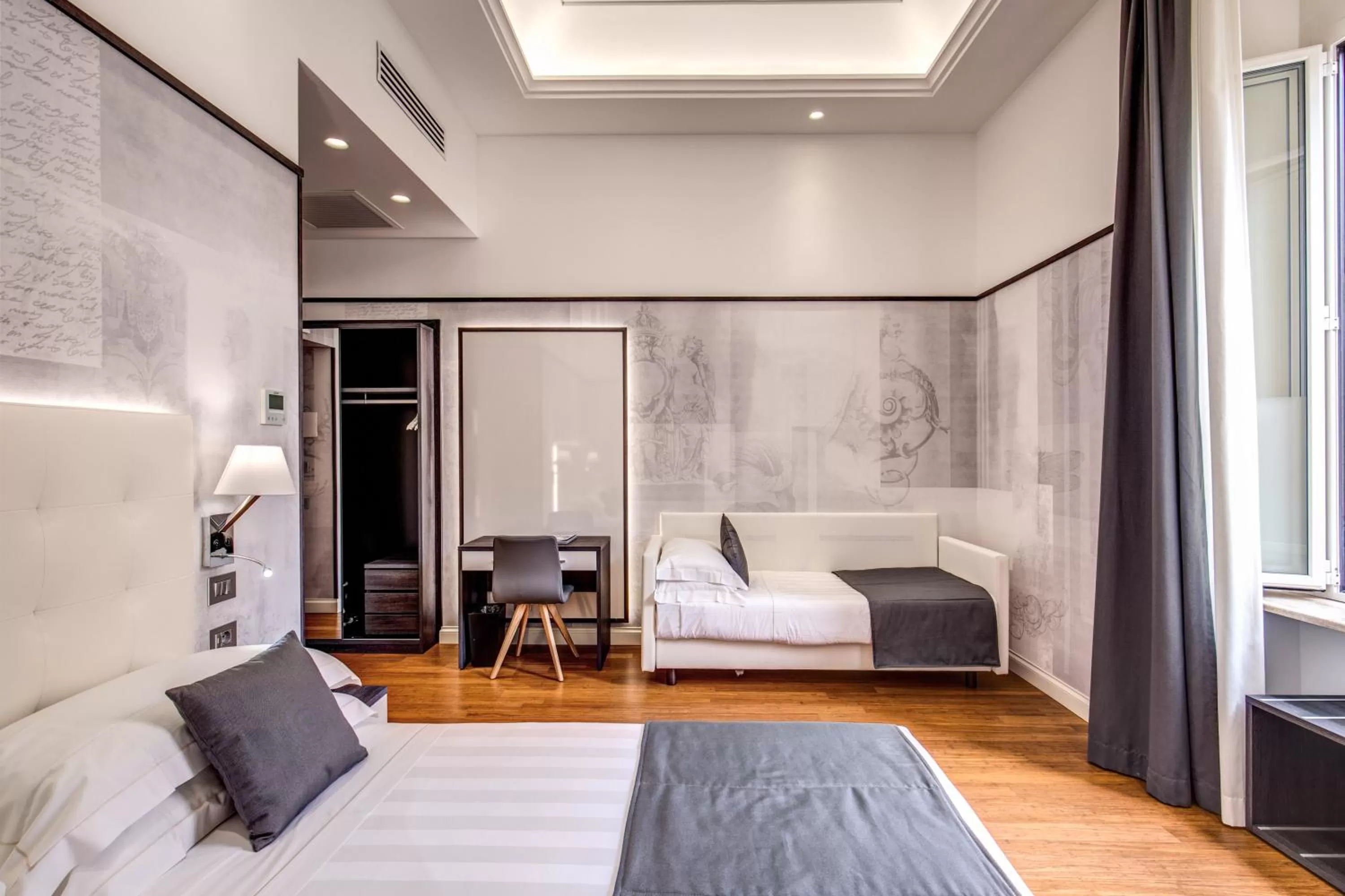 Photo of the whole room, Bed in The Liberty Boutique Hotel